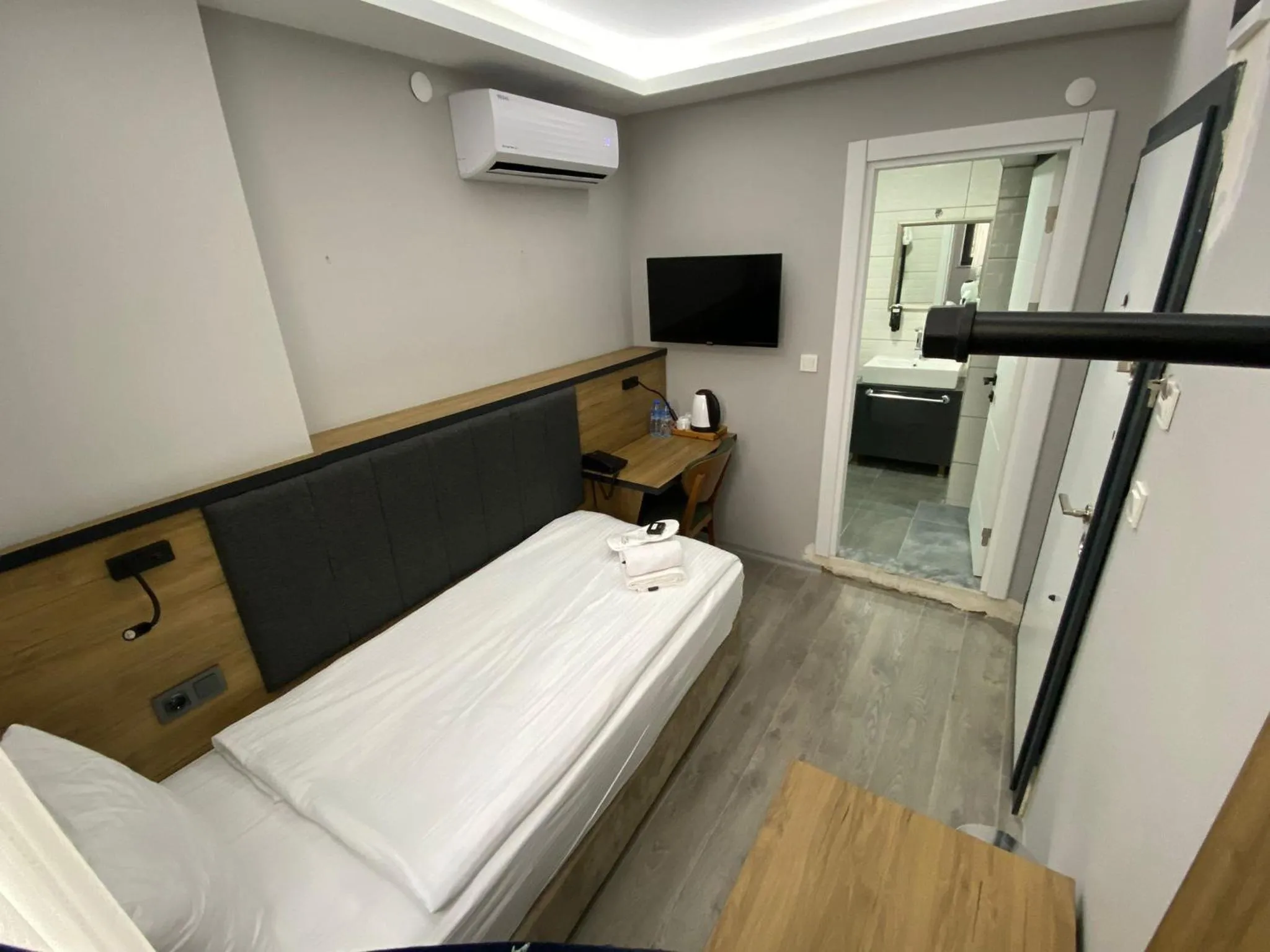 Bed in Comfort Center Suit Hotel
