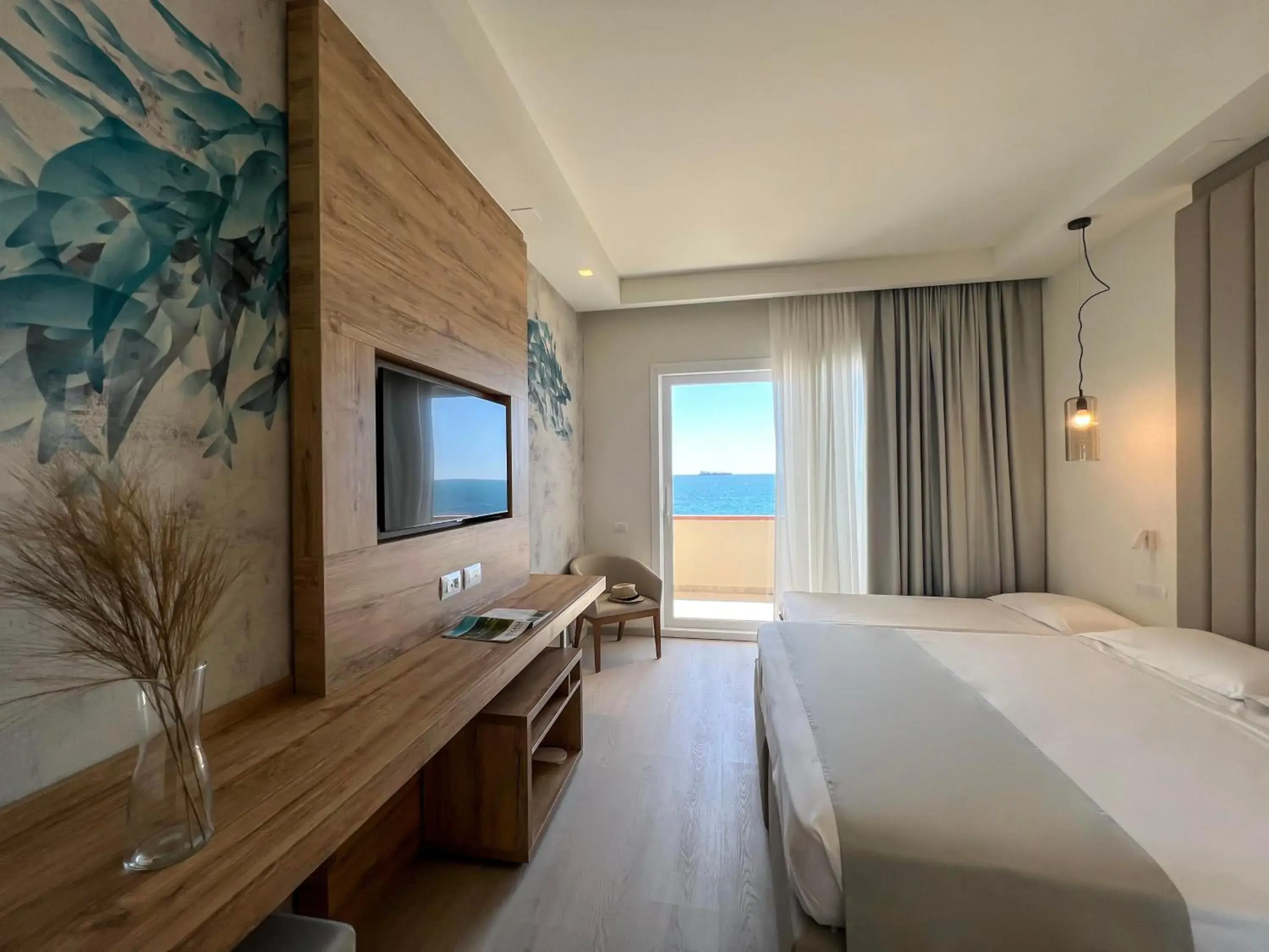 Triple Room with Sea View and Beach Access in Hotel Rex Triple Room with Sea View and Beach Access in Hotel Rex