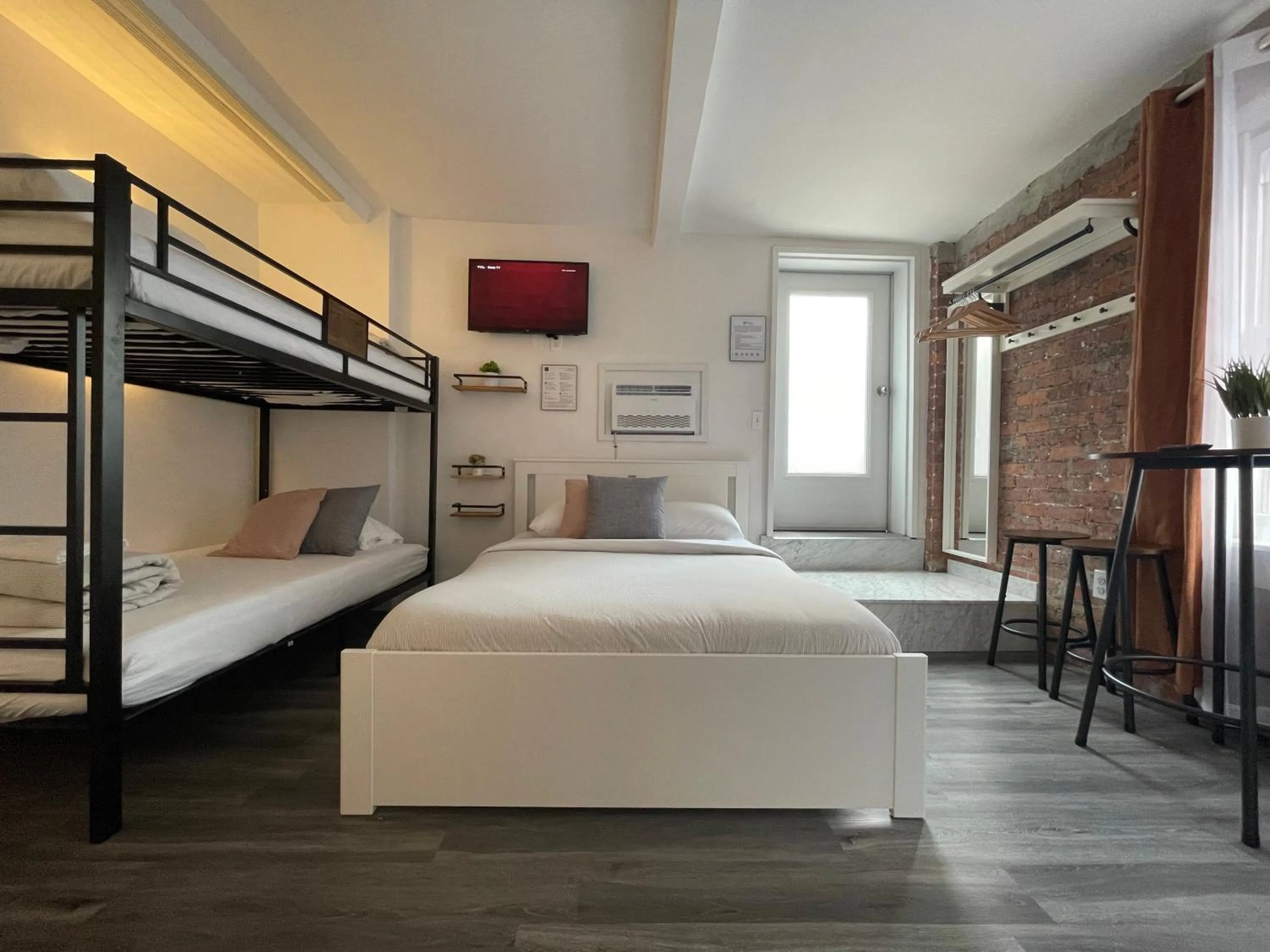 Bed in Hotel and the City, Rooftop City View