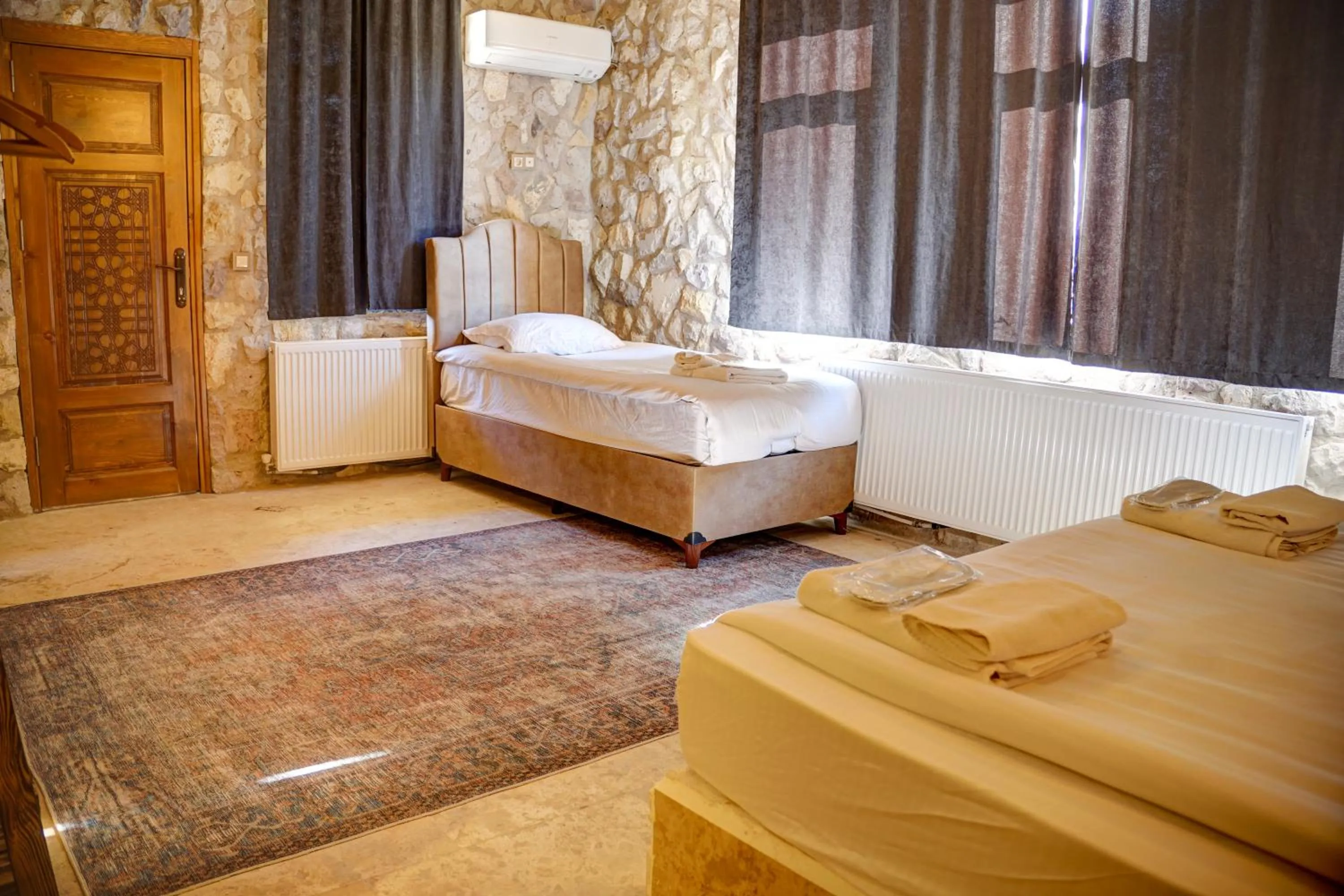 Bed in Ala Stone House