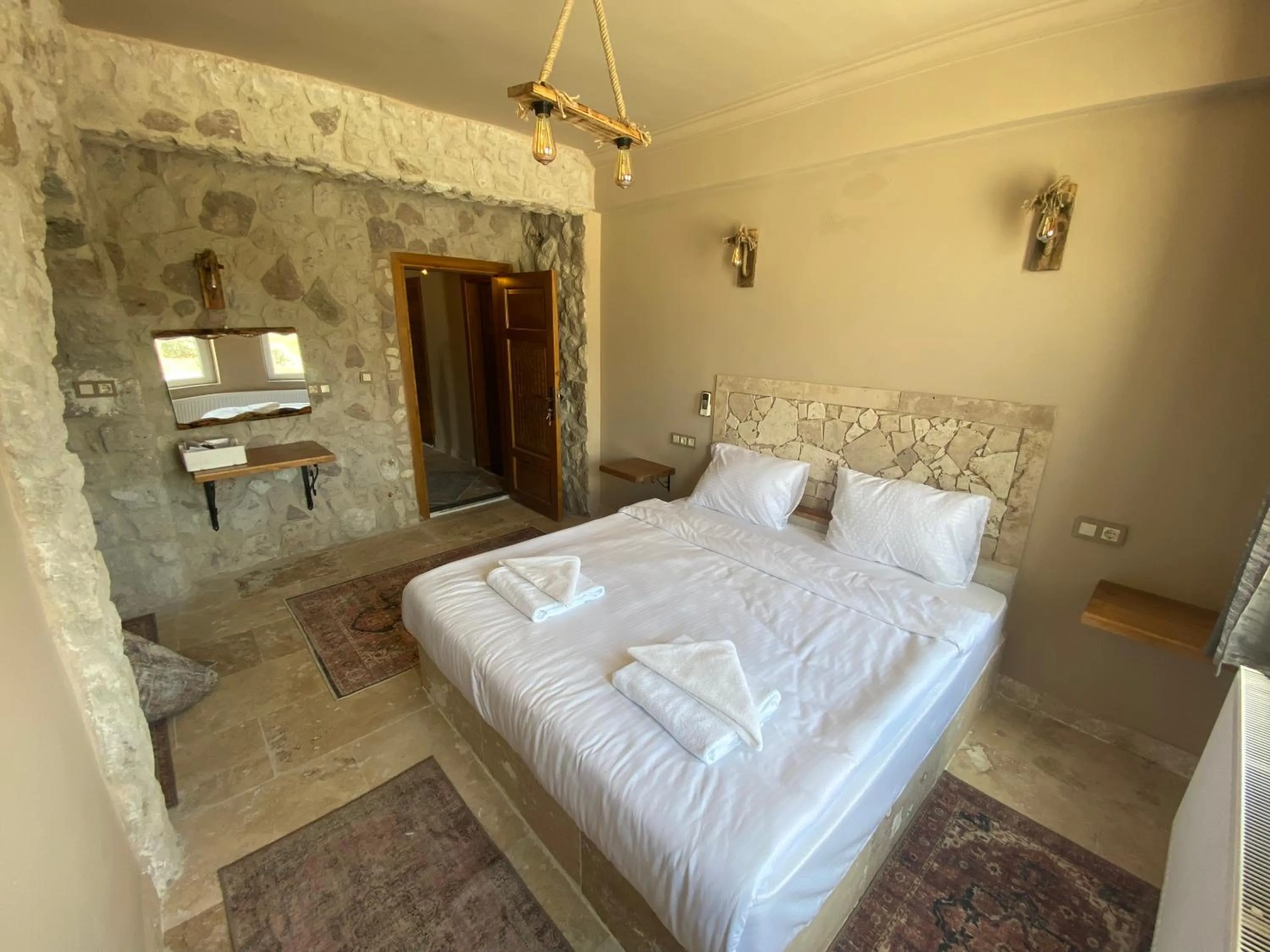 Bed in Ala Stone House