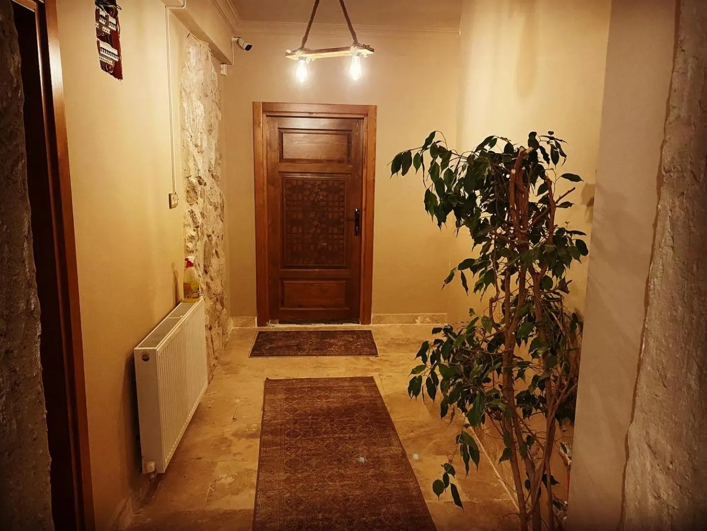 Facade/entrance in Ala Stone House