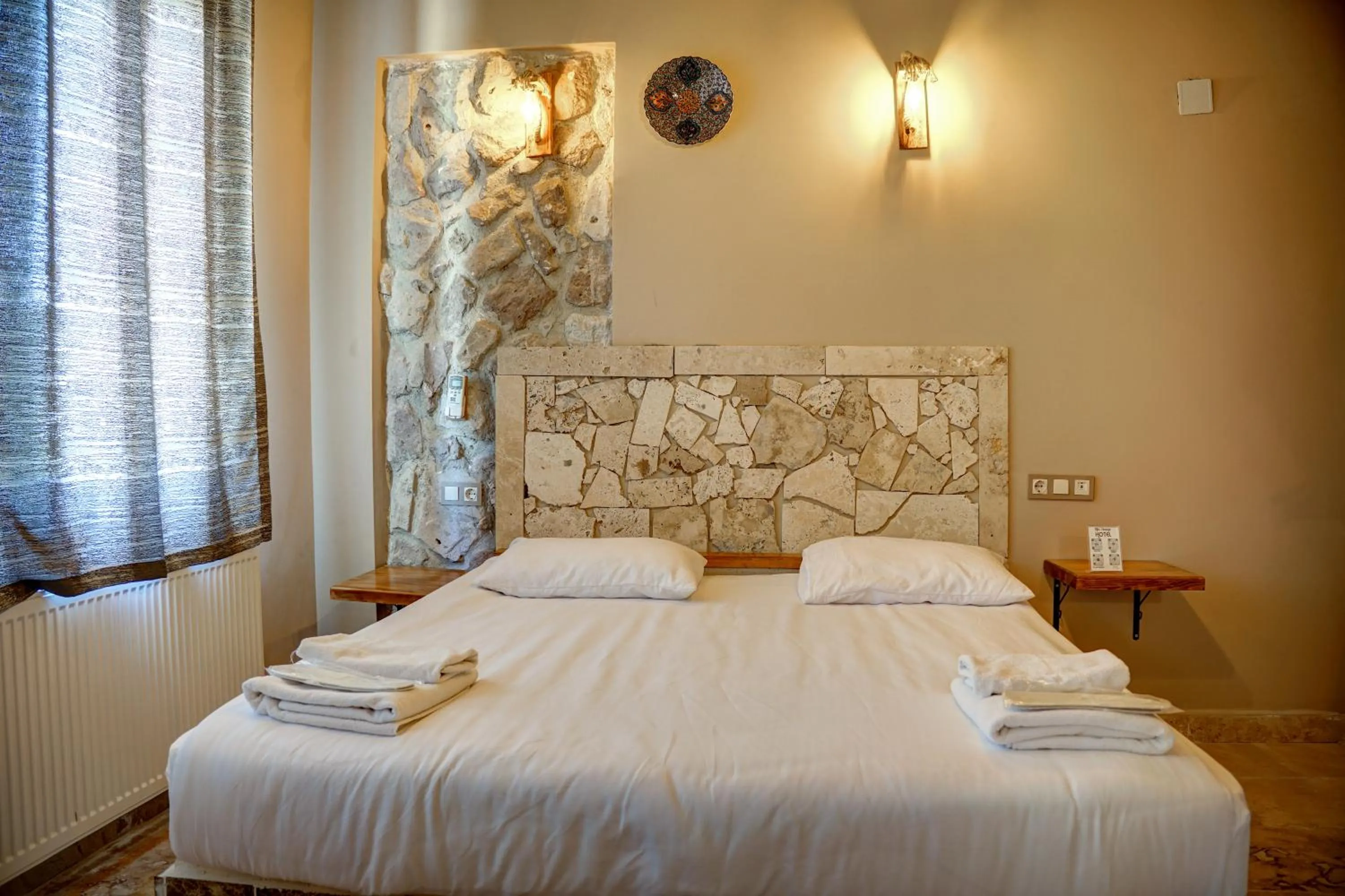 Bed in Ala Stone House