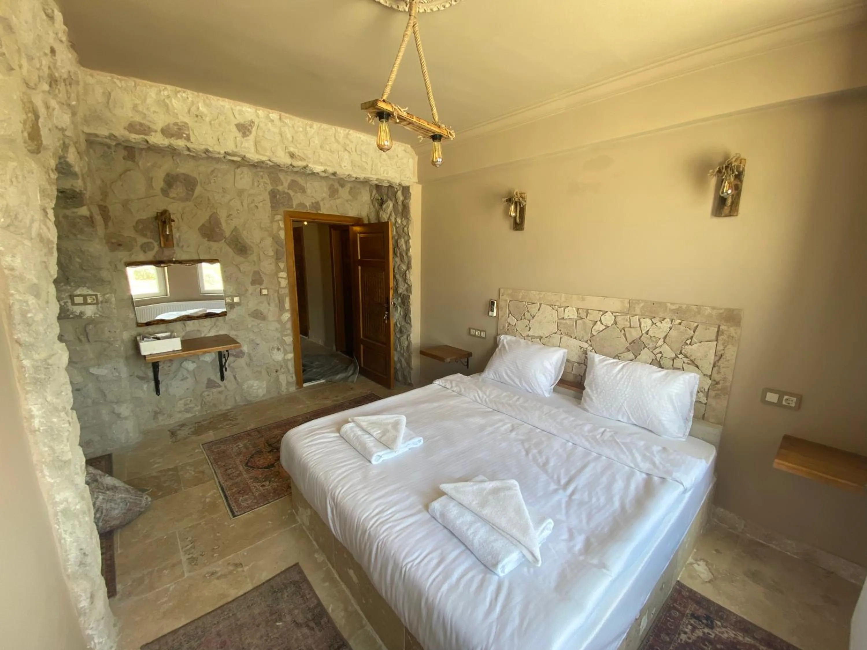 Photo of the whole room, Bed in Ala Stone House