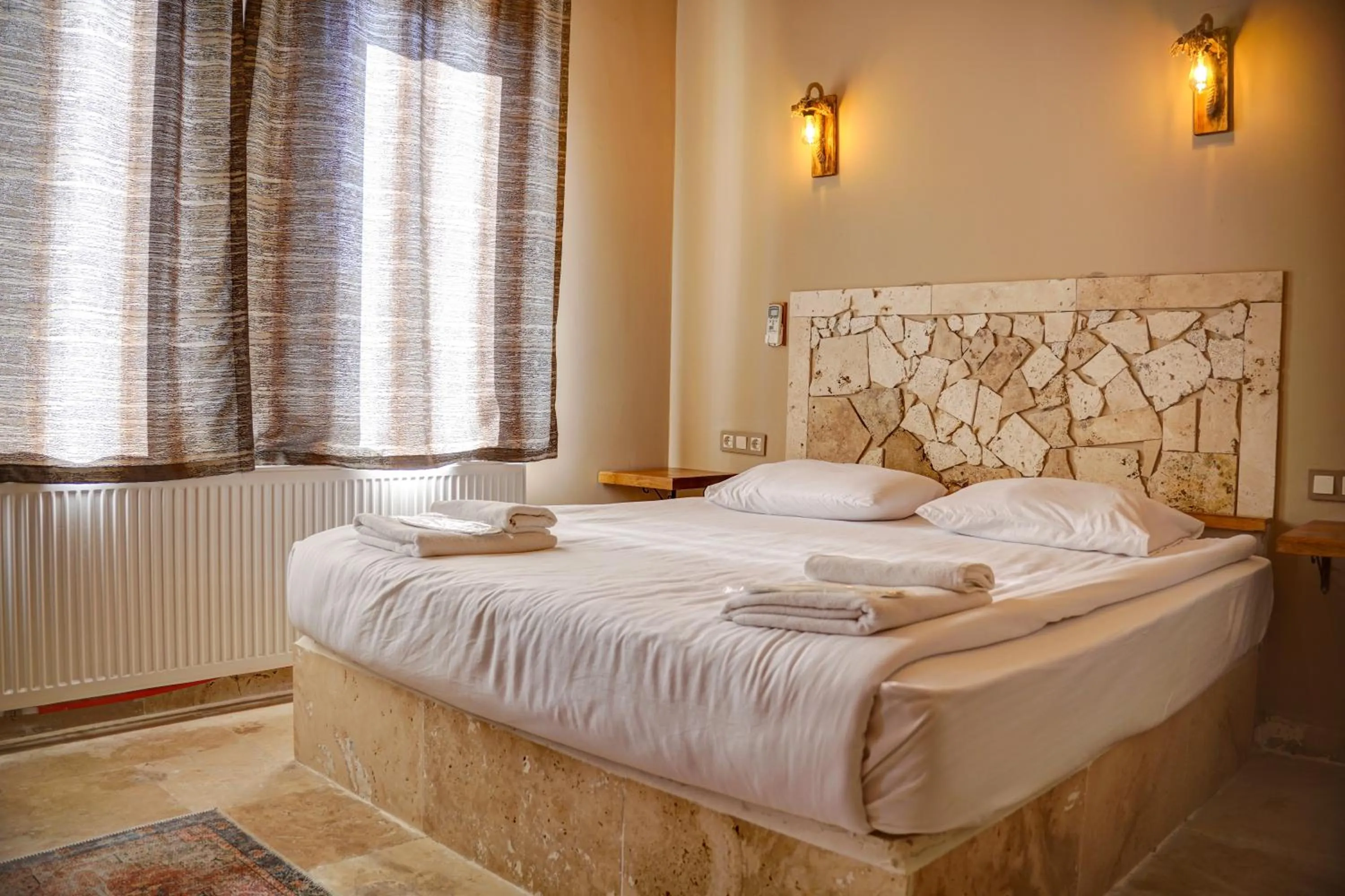 Bed in Ala Stone House