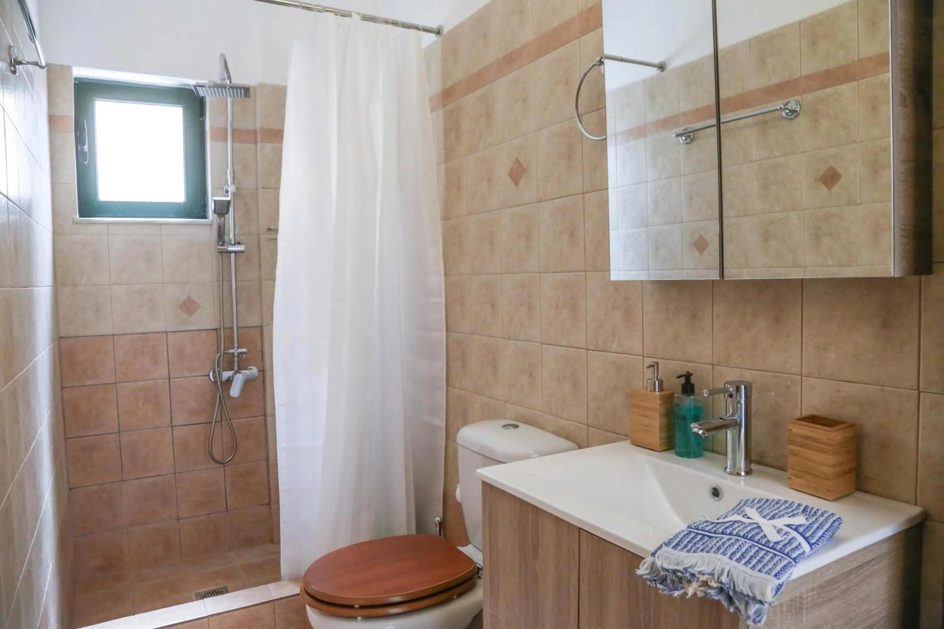 Bathroom in Oliva Holiday Homes