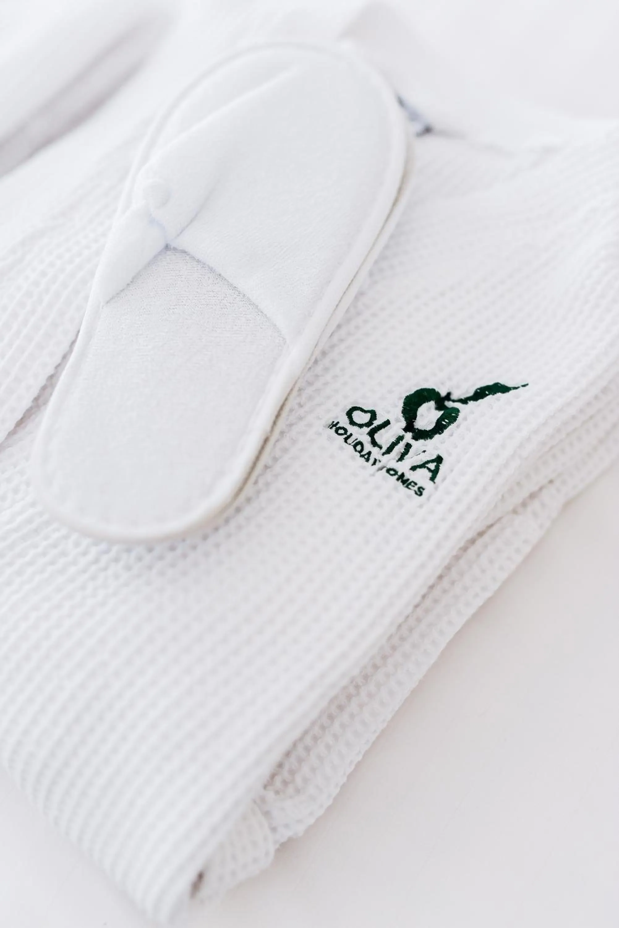 Property logo or sign in Oliva Holiday Homes