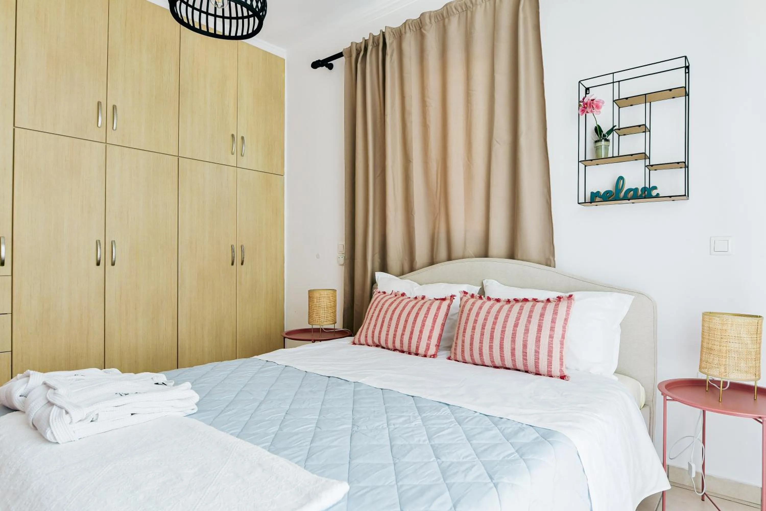 Bed in Oliva Holiday Homes