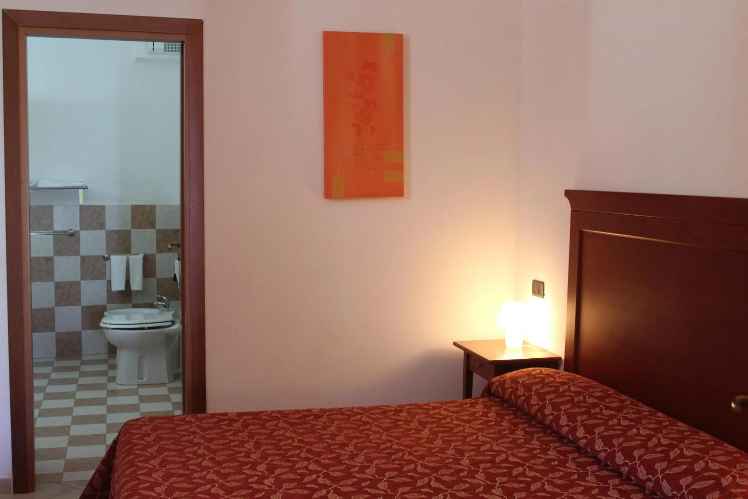 Bed in Albergo Villa Vittoria