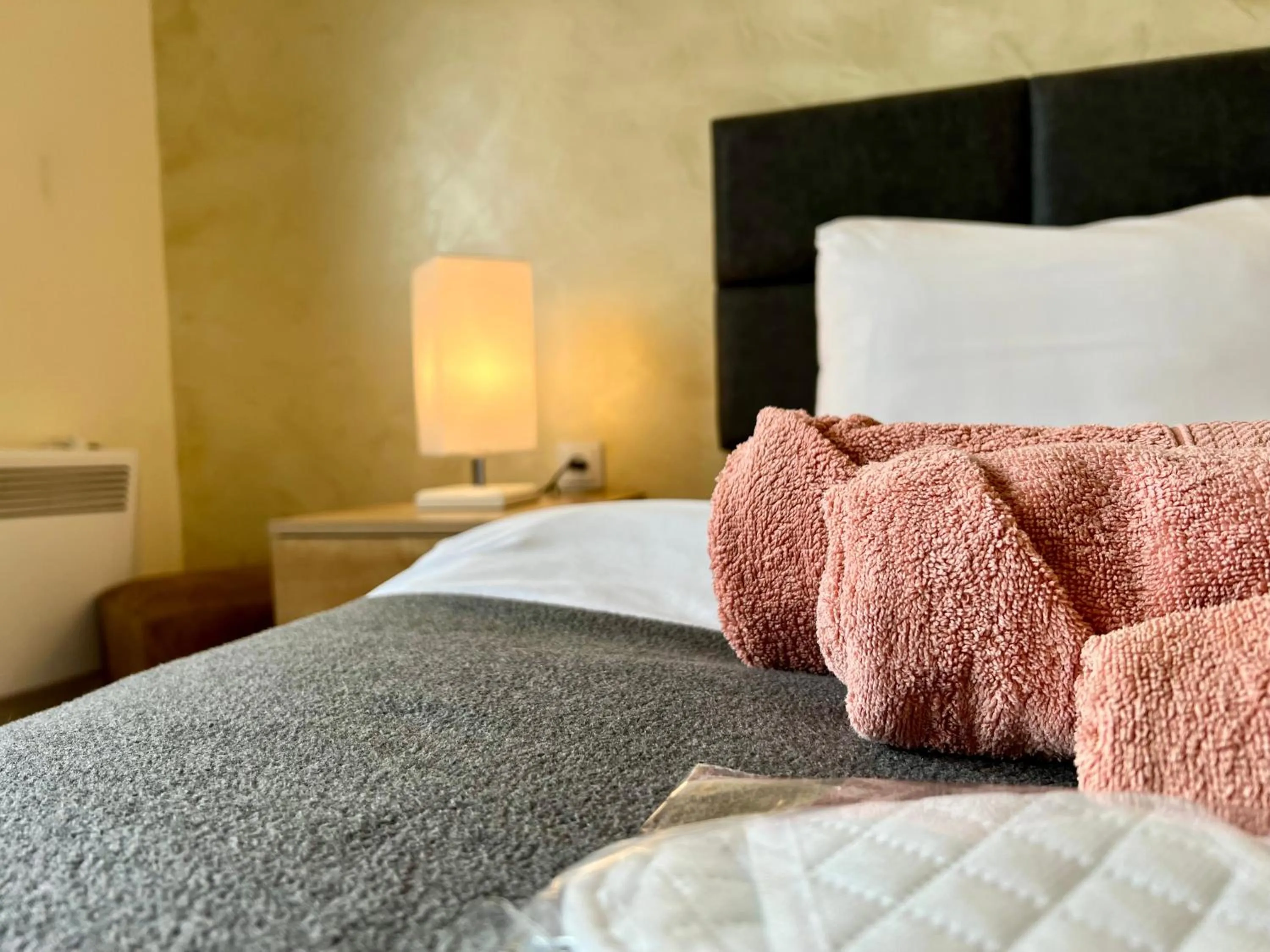 towels, Bed in The Hill Guesthouse