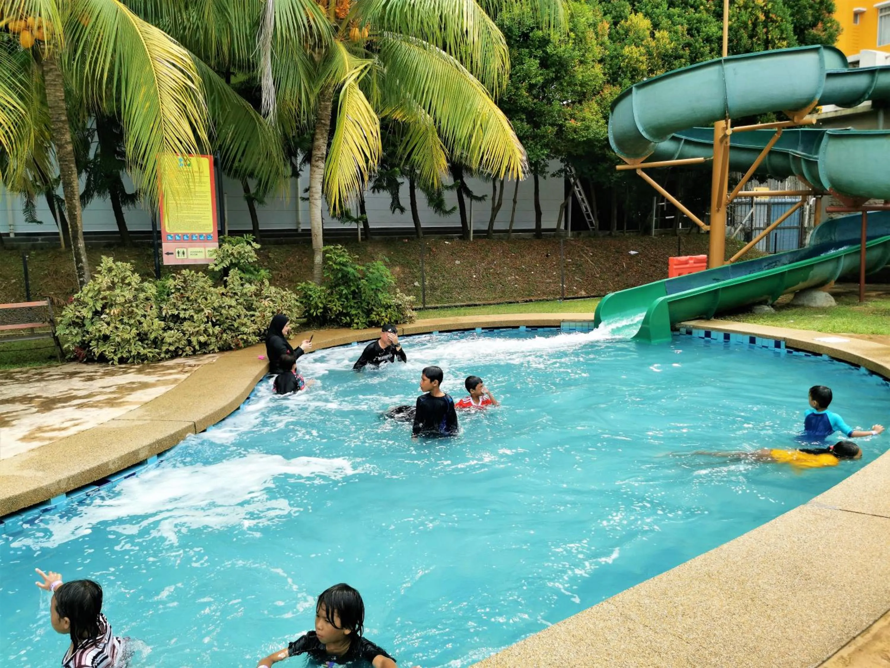 People in FHS Water Themepark Resort Melaka Town City Tengah