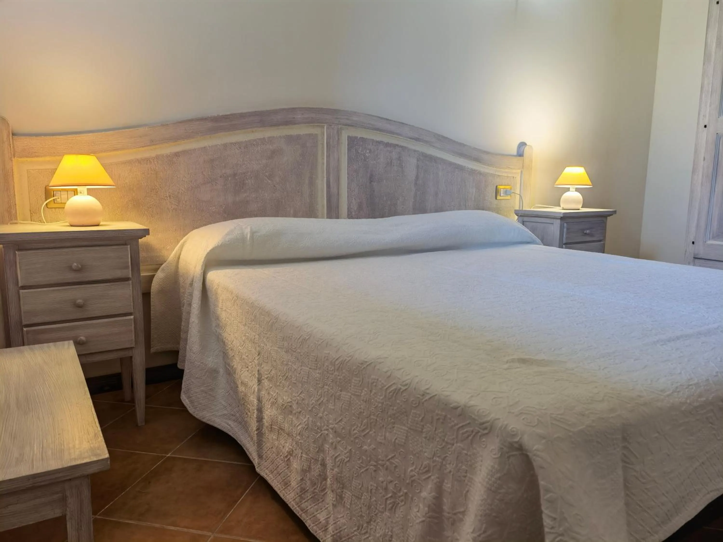 Bed in La Corte degli Ulivi - Albergo Rurale