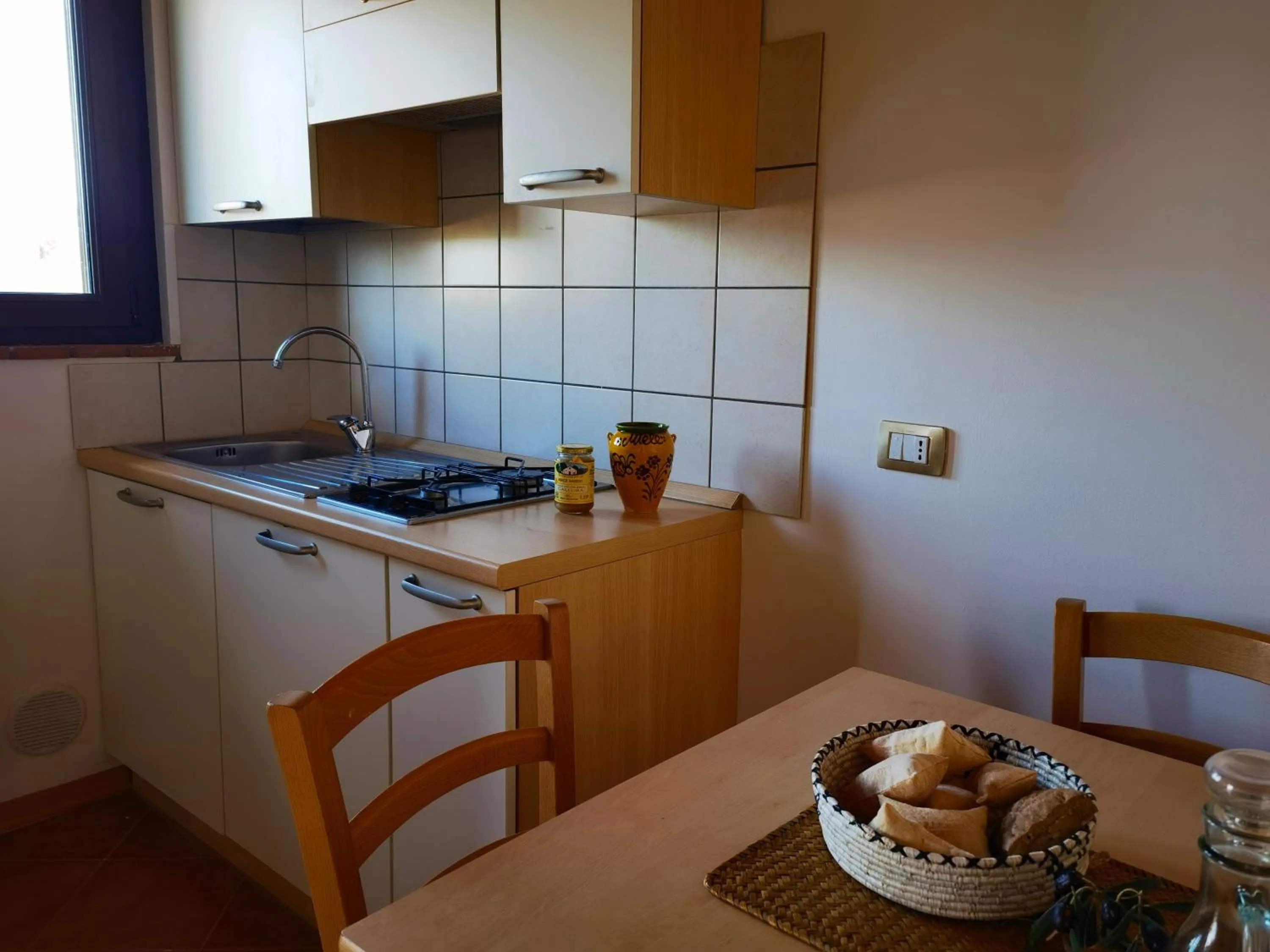 Kitchen or kitchenette in La Corte degli Ulivi - Albergo Rurale