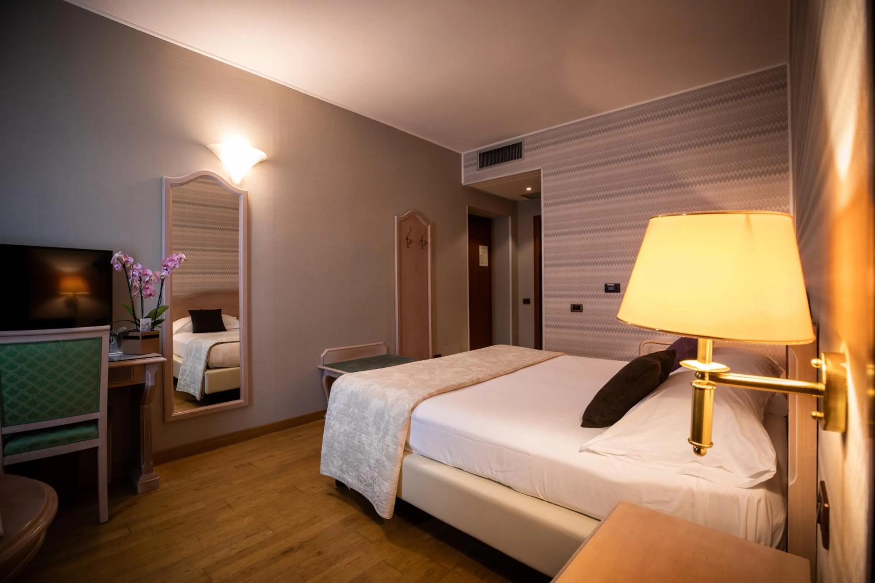 Bed in Hotel Palazzo Lovera