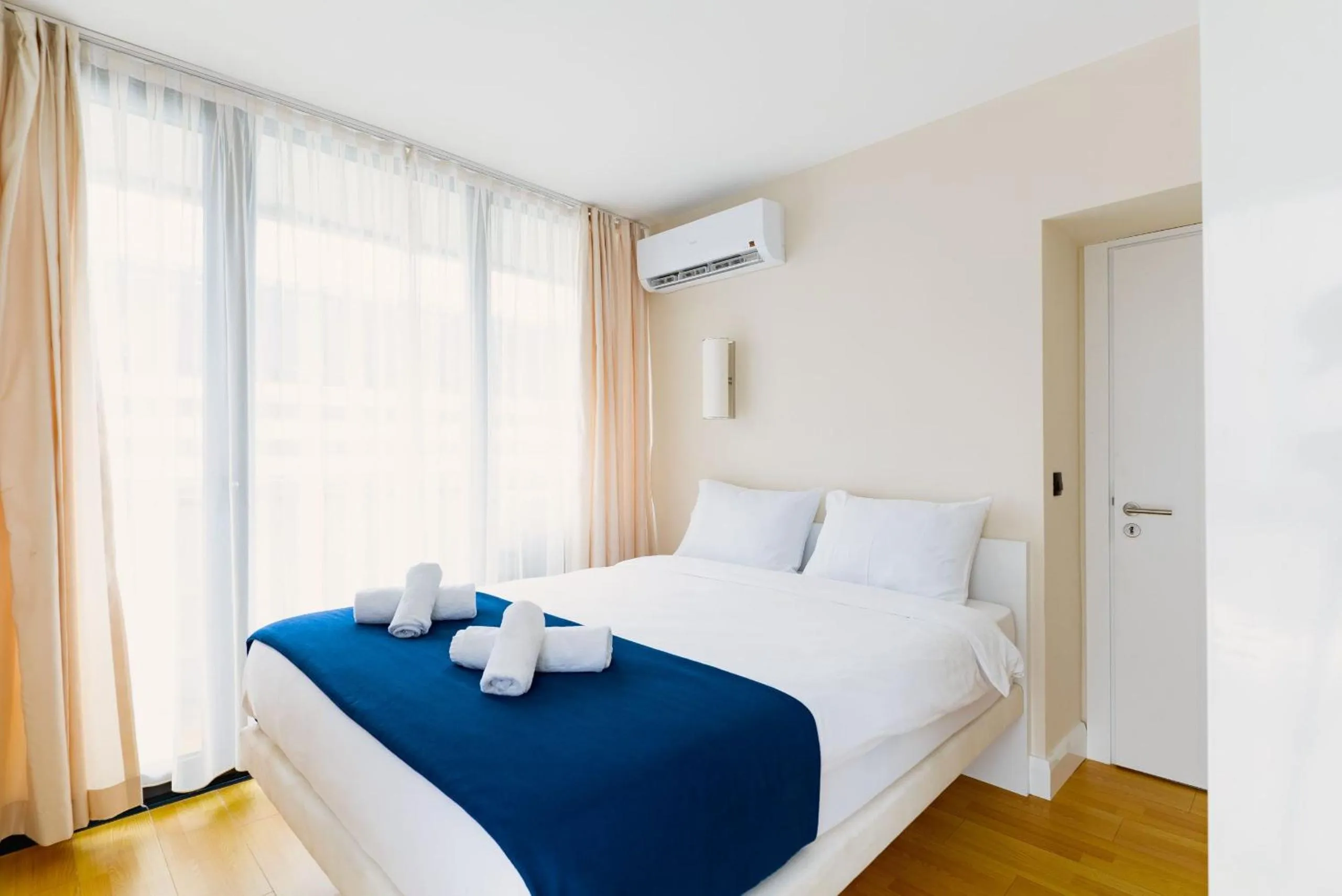 Bed in Orbi City Hotel With Sea View