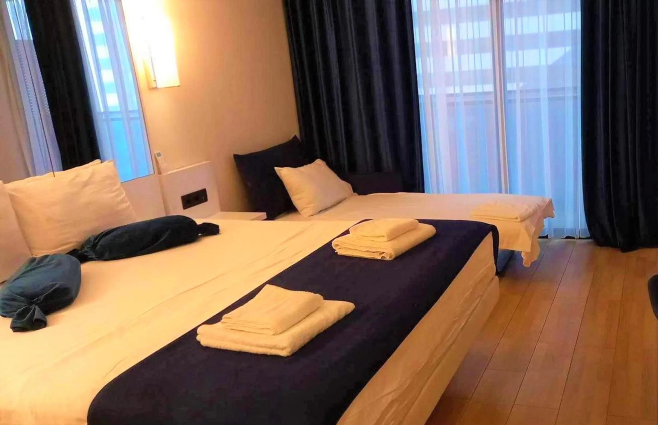 Bed in Orbi City Hotel With Sea View