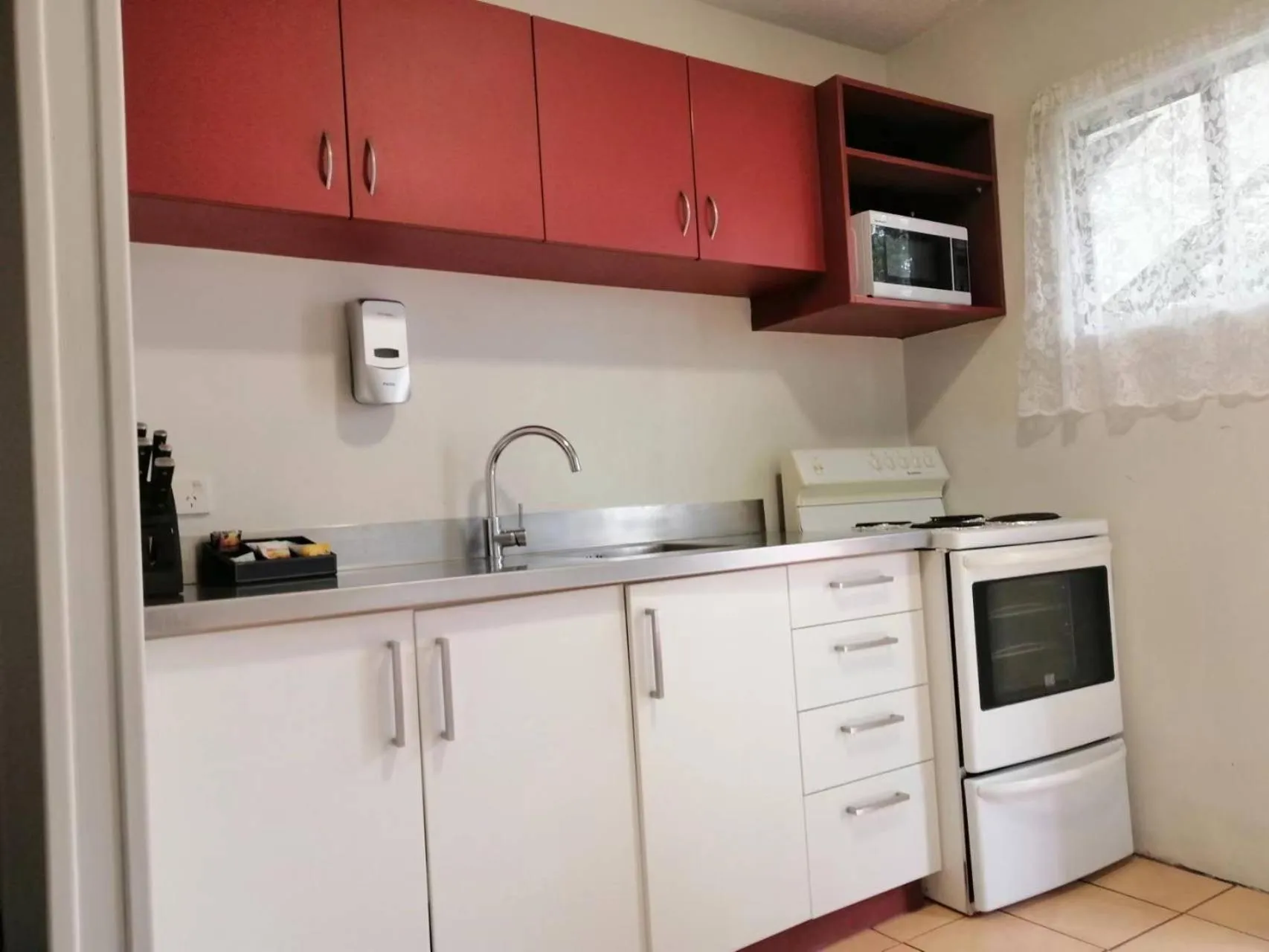 Kitchen or kitchenette in Stanley Apartments
