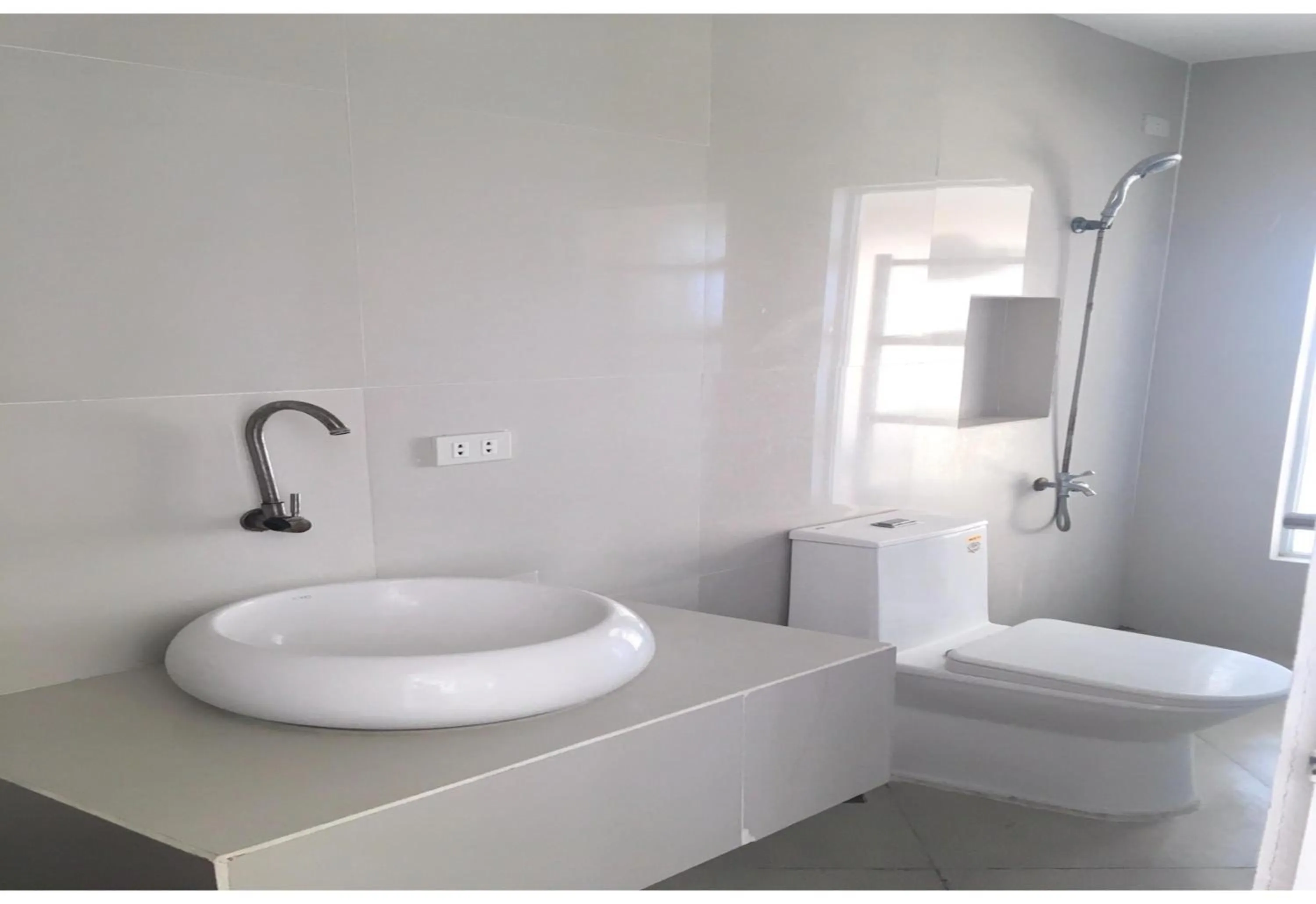 Bathroom in OYO 921 Sorrento Hotel And Resort