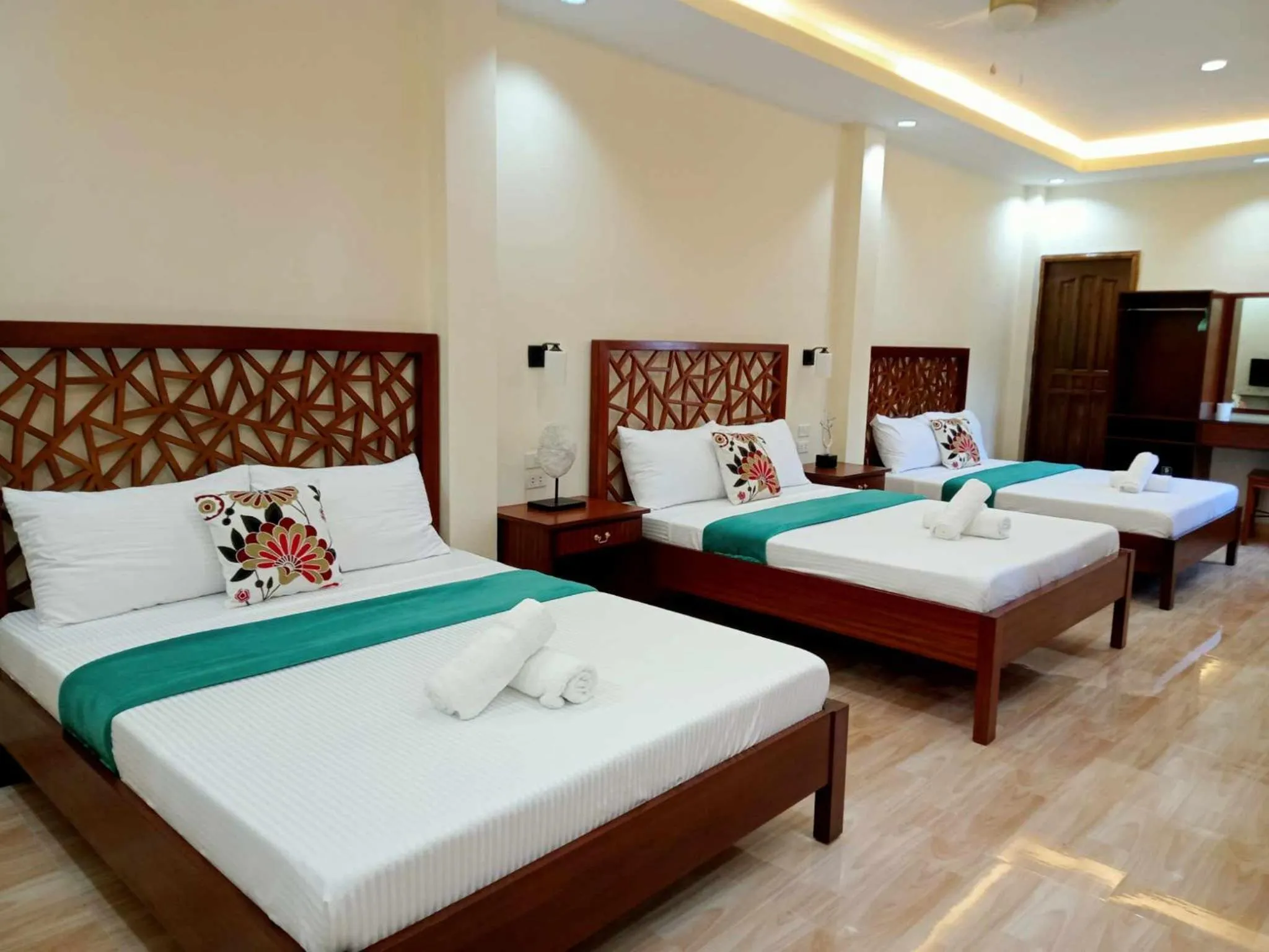 Bed in PMG Islandscape Resort