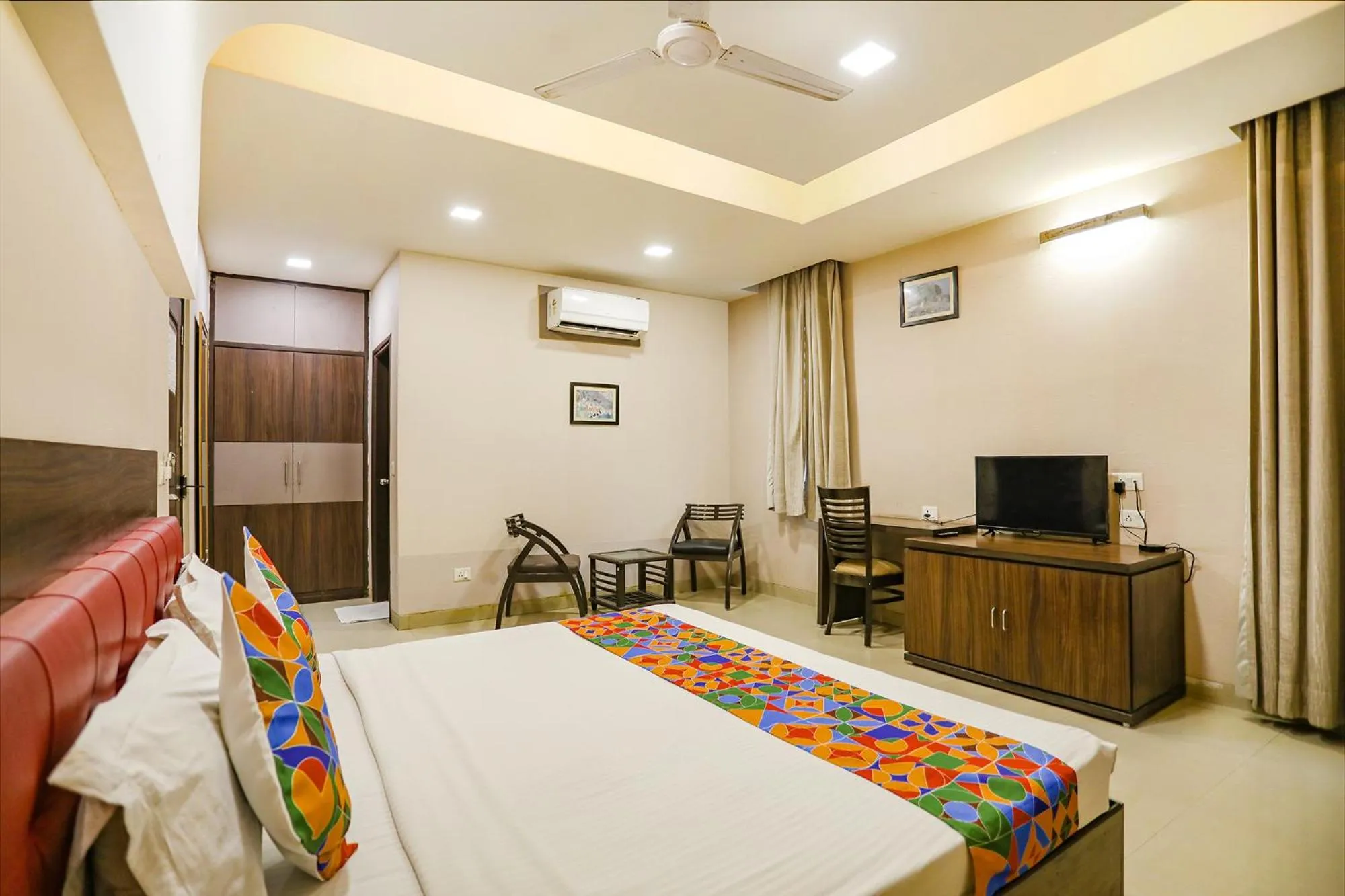 Bed in FabHotel Grand Olive