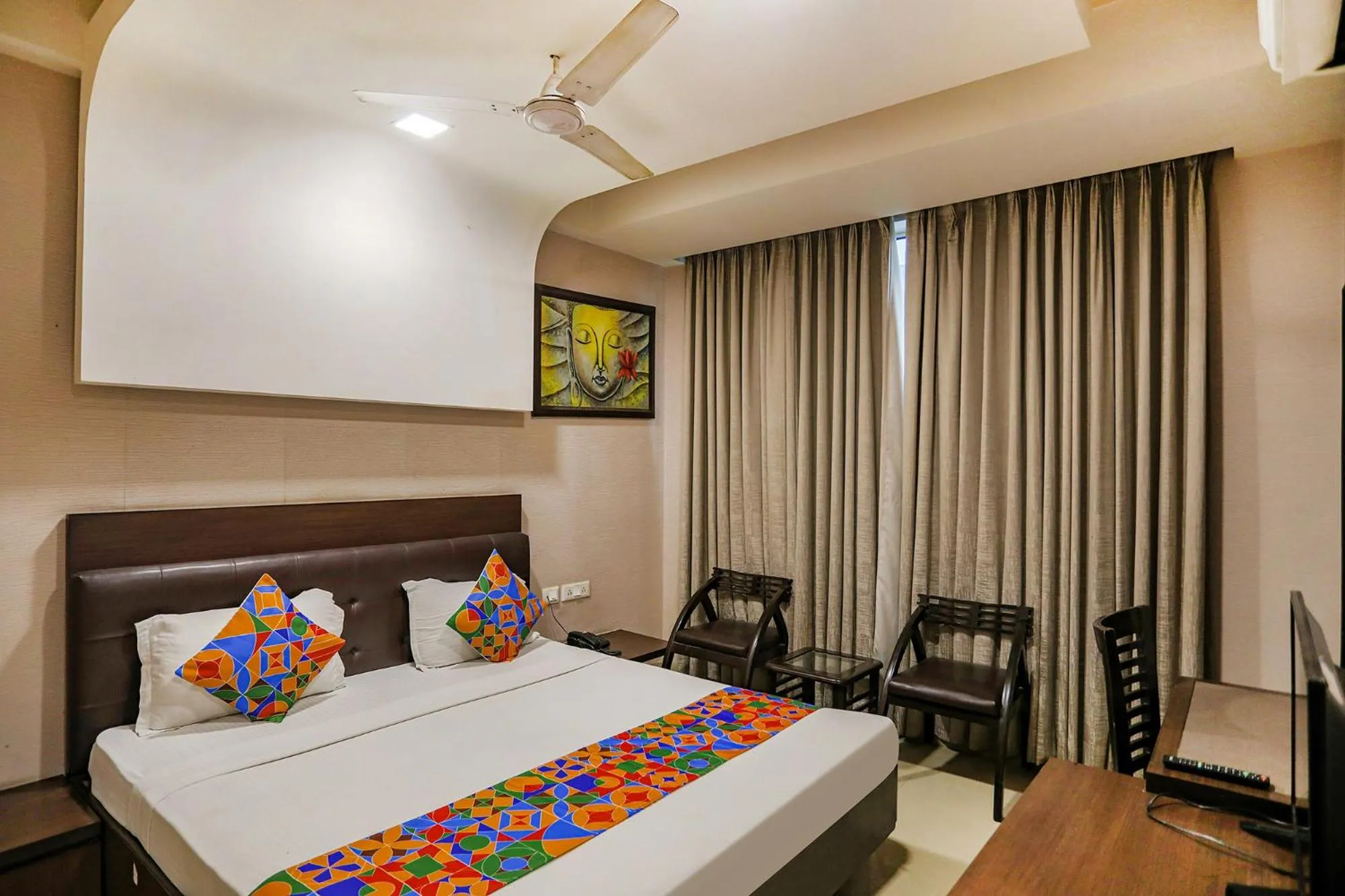 Bed in FabHotel Grand Olive