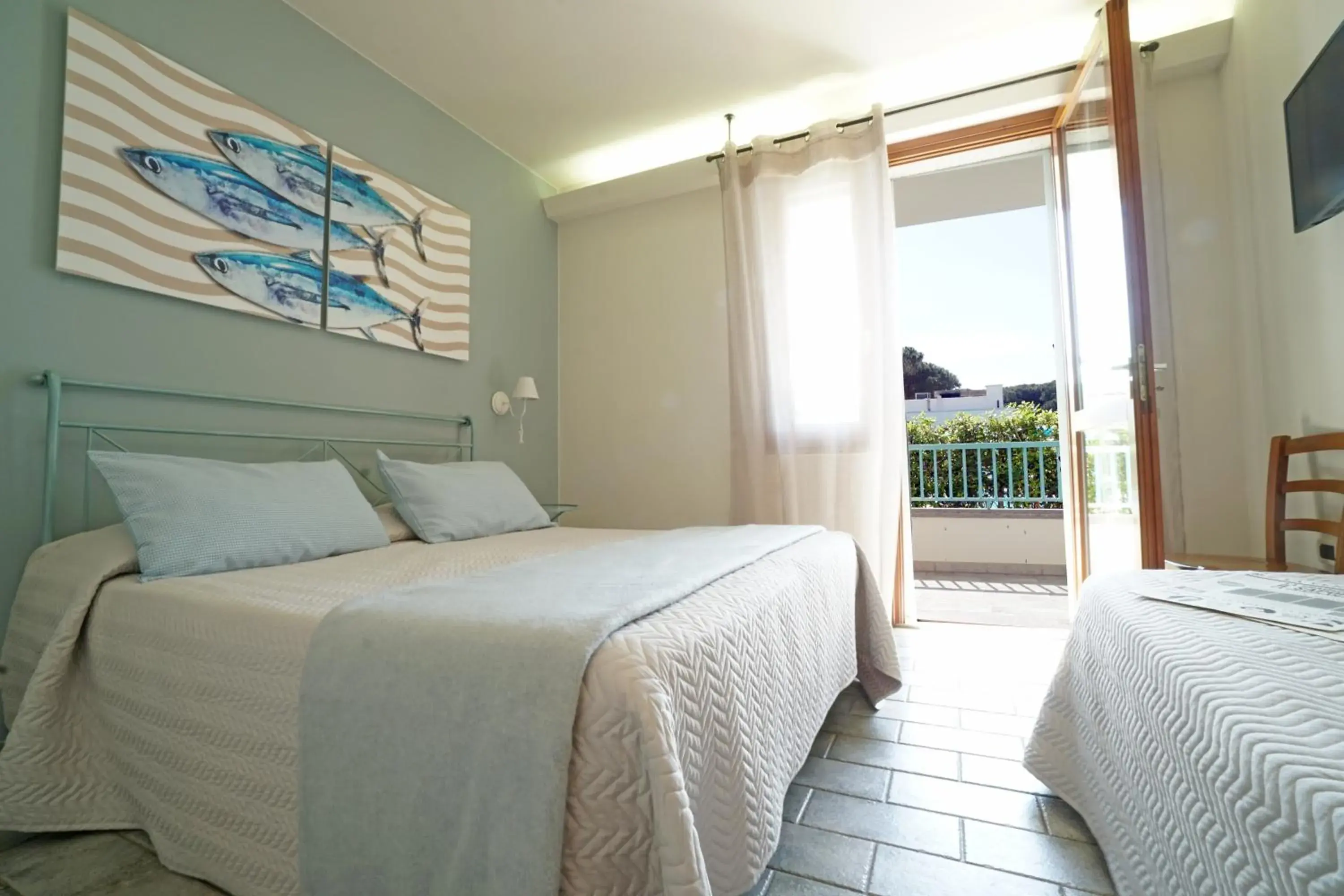 Quadruple Room in Hotel Residence La Ventola Quadruple Room in Hotel Residence La Ventola