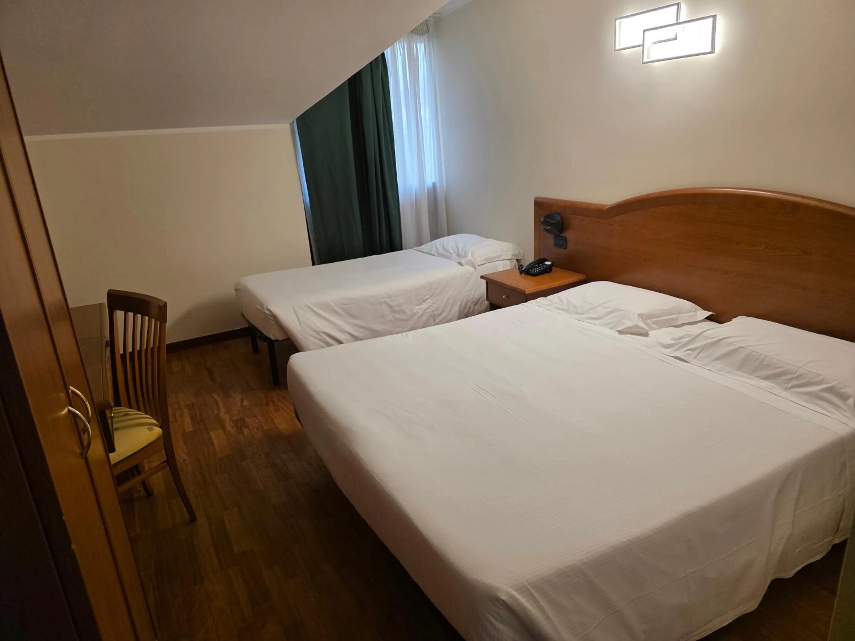 Bed in Hotel Dimora Adriana