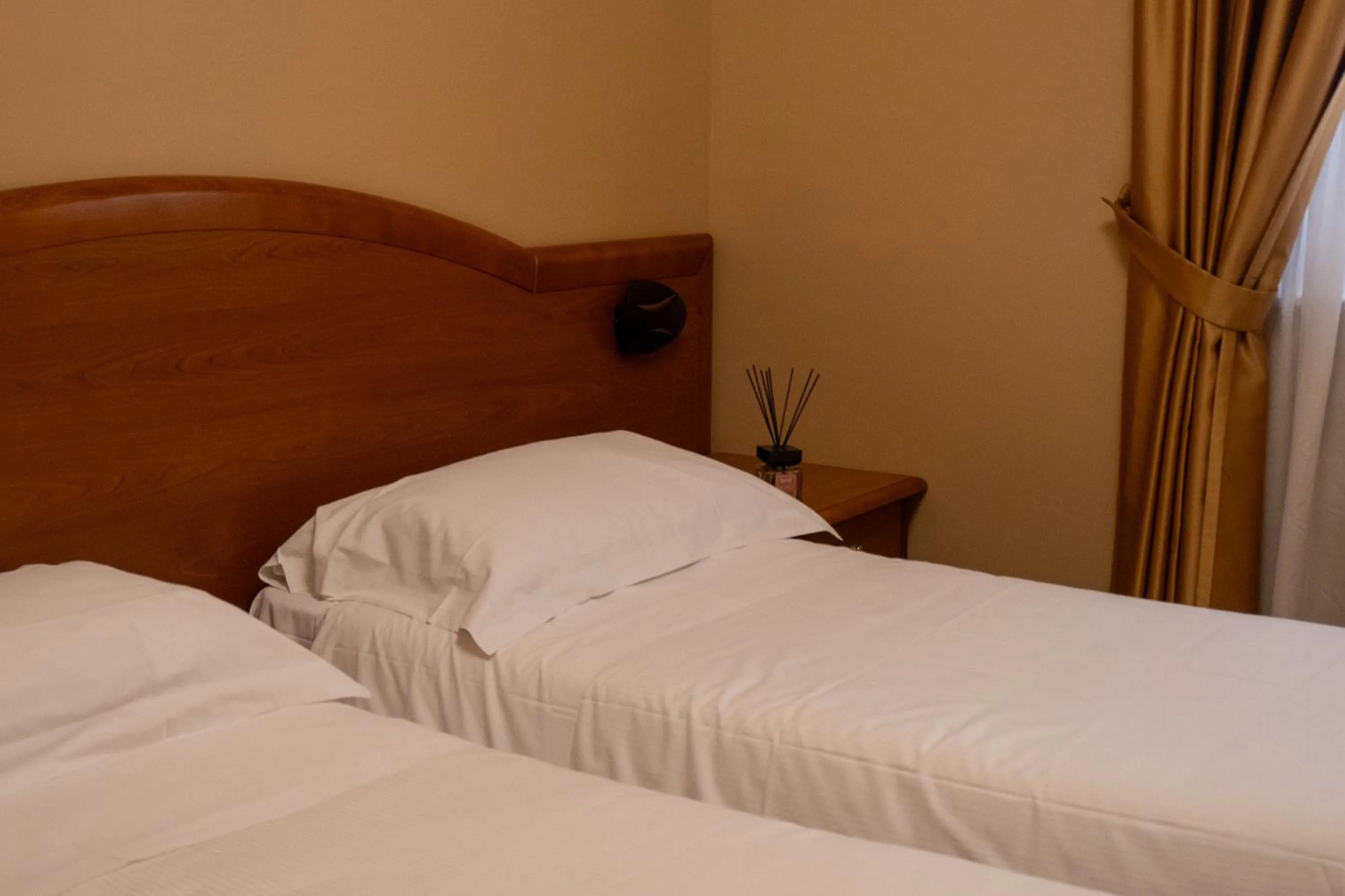 Bed in Hotel Dimora Adriana