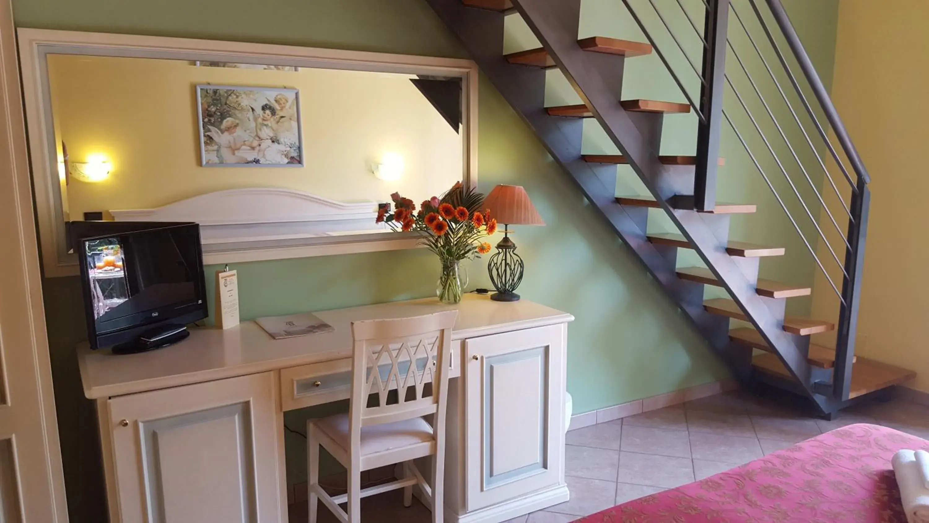 Superior Quadruple Room in Hotel Duca Della Corgna Superior Quadruple Room in Hotel Duca Della Corgna