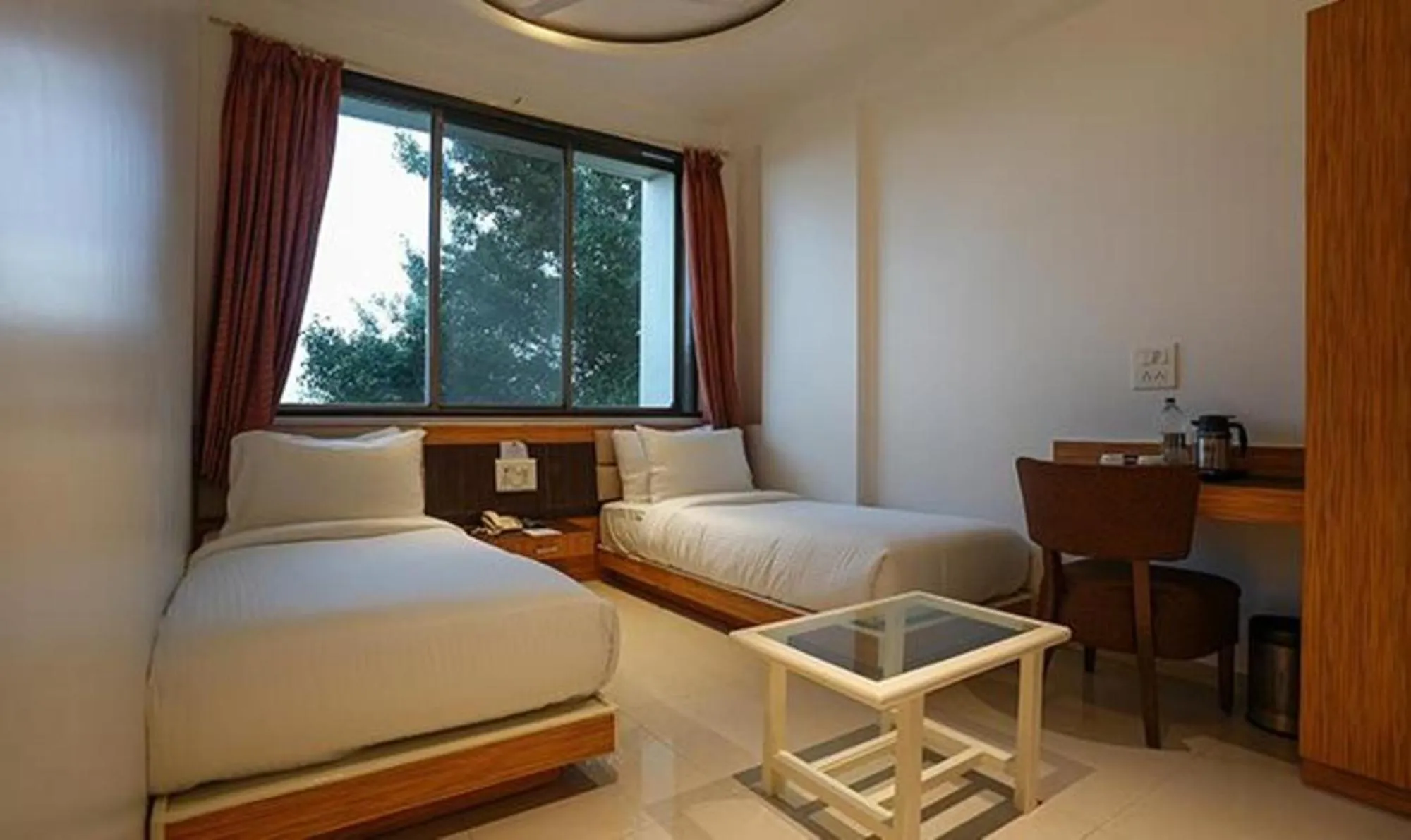 Bed in FabHotel Prime Rester Select - in chakan