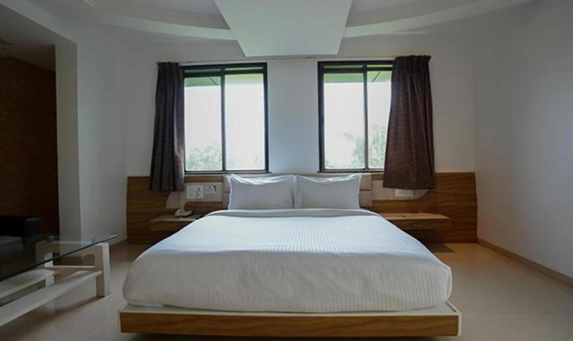 Bed in FabHotel Prime Rester Select - in chakan