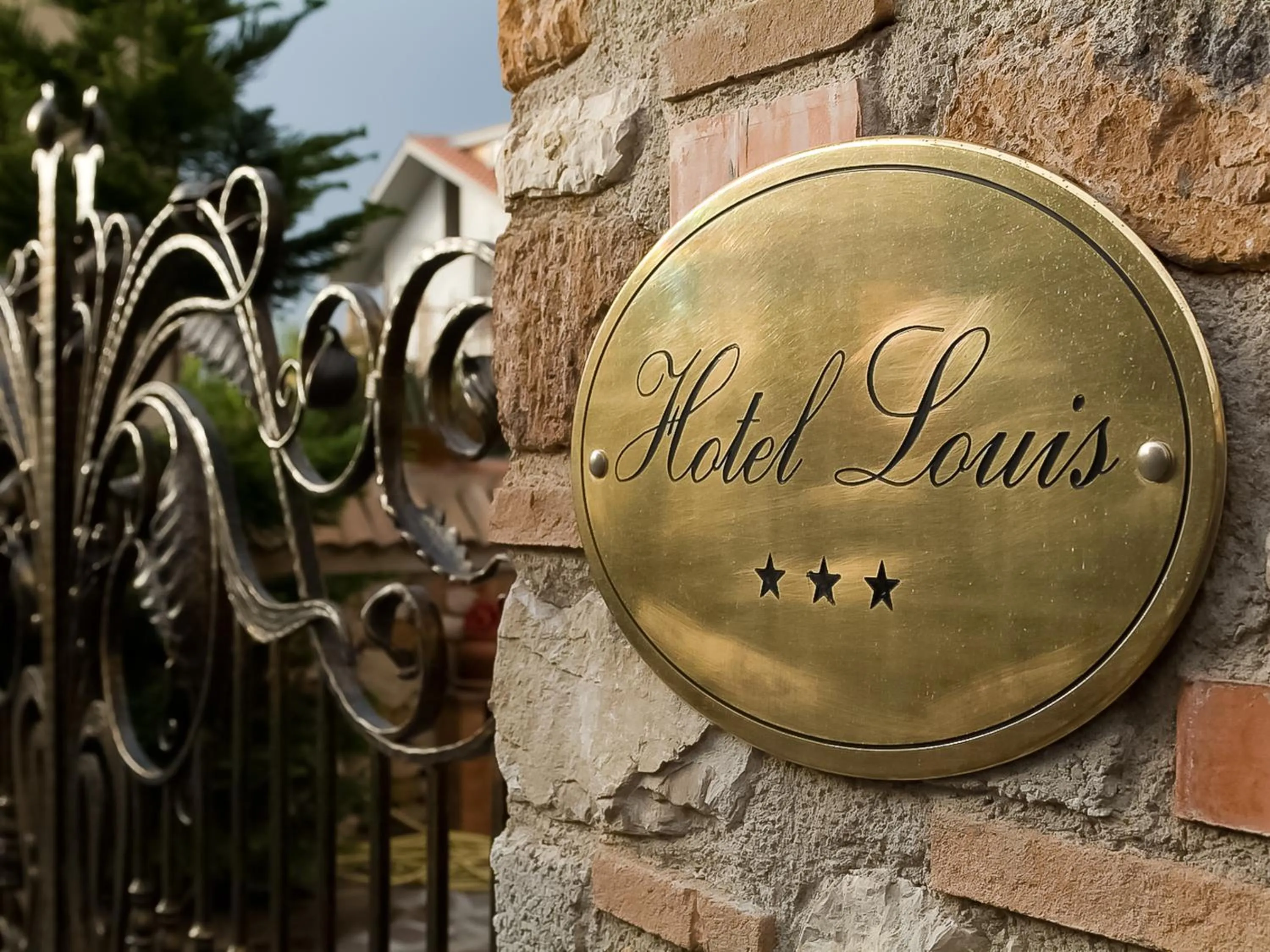 Property logo or sign in Hotel Louis II