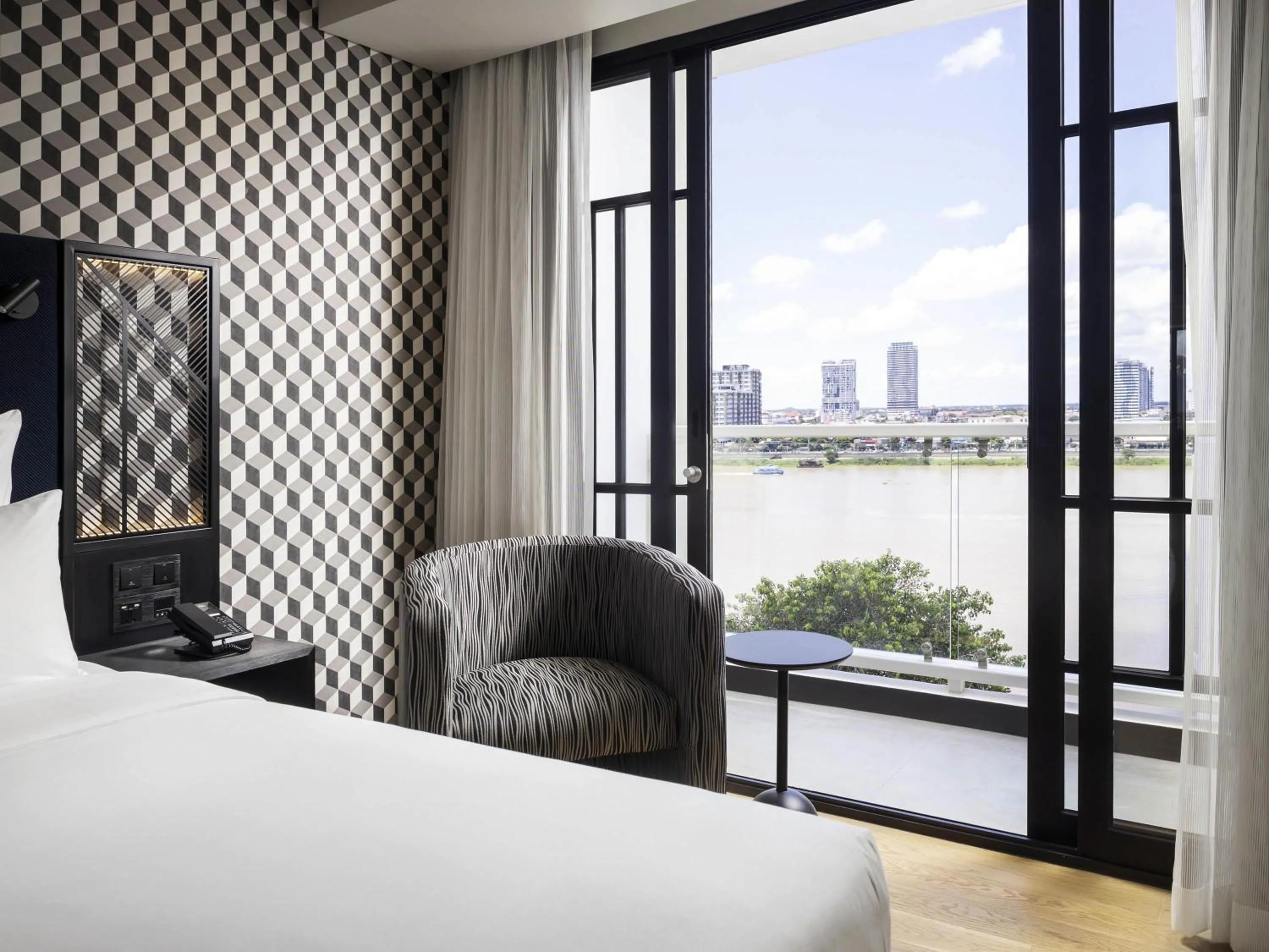 Bedroom, Bed in TRIBE Phnom Penh Post Office