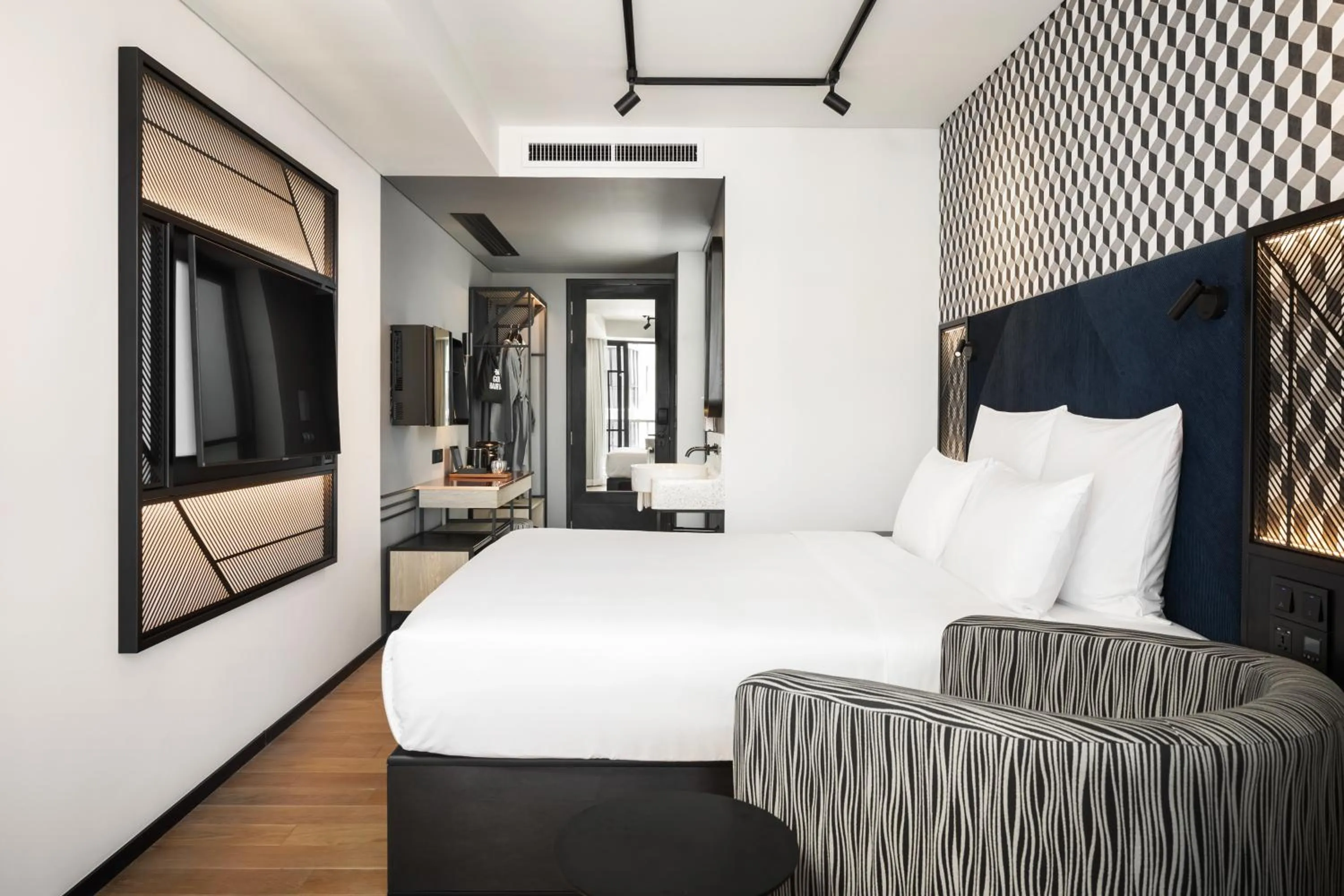 Bed in TRIBE Phnom Penh Post Office