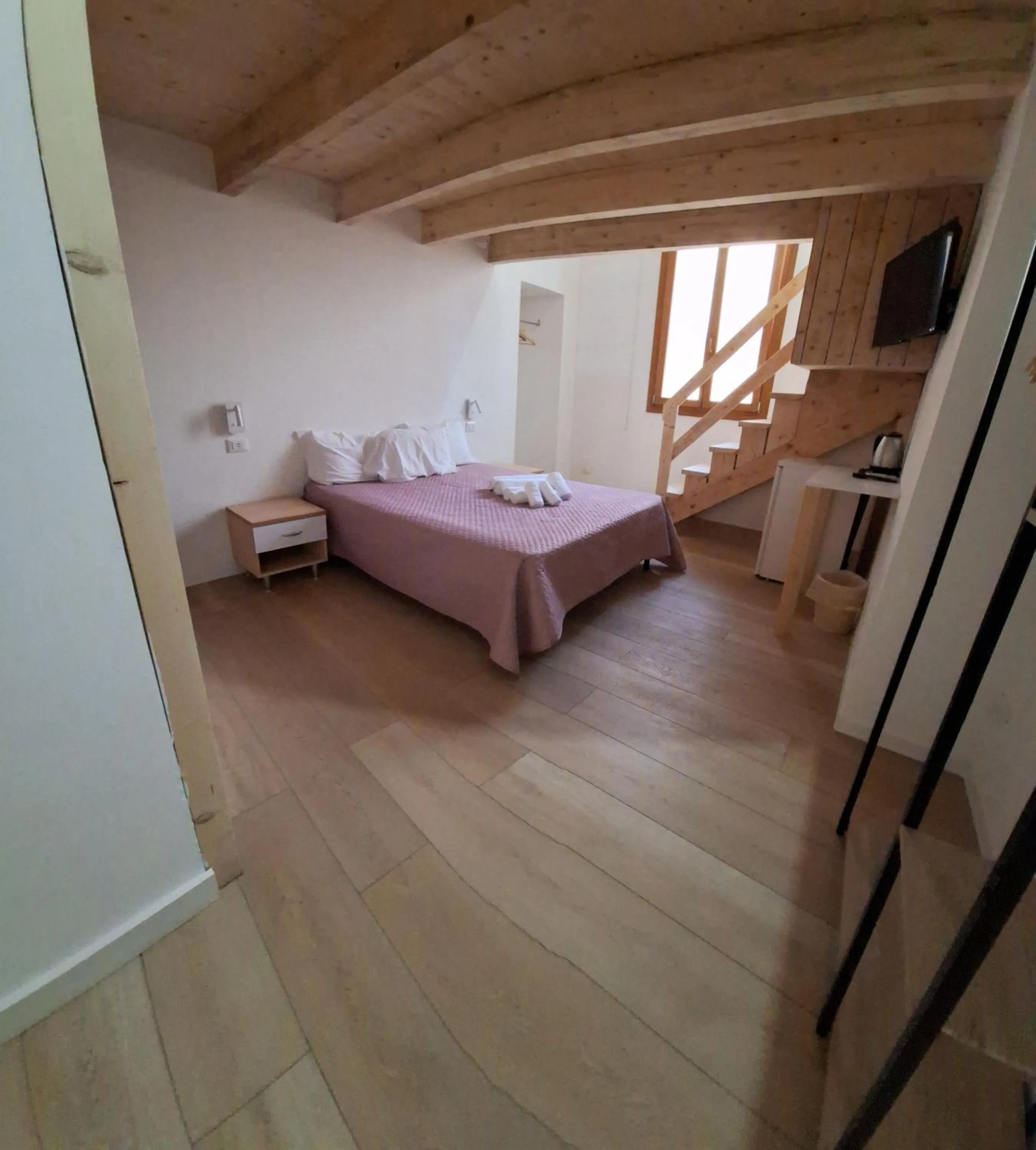 Photo of the whole room, Bed in Residence Cortile Mercè