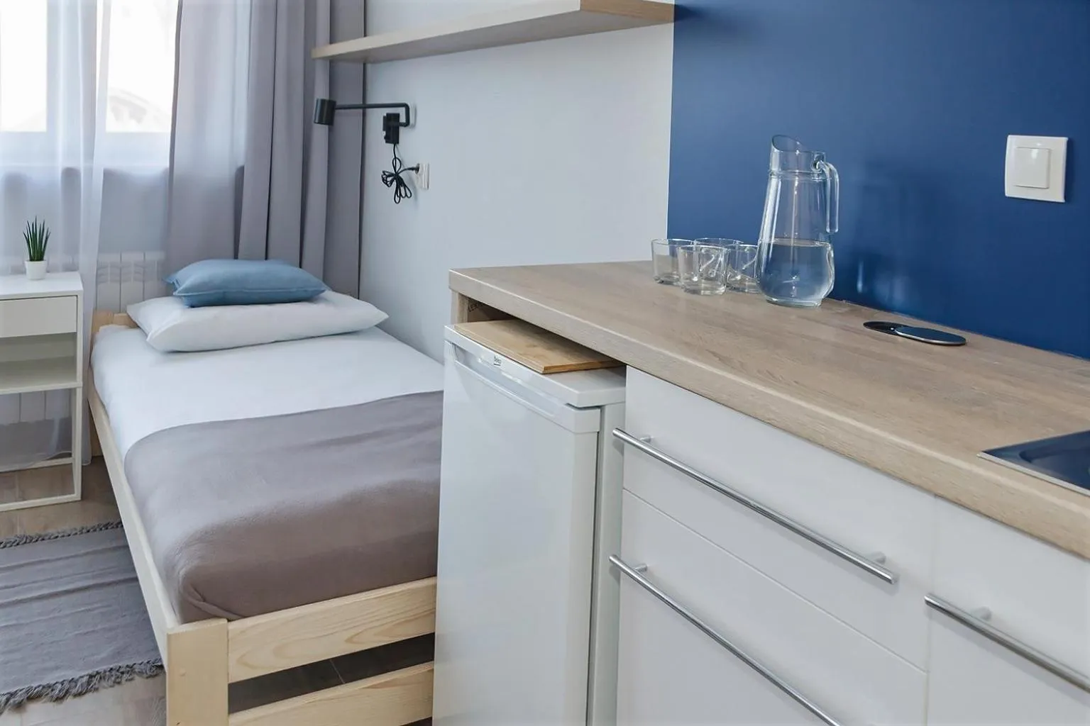 Kitchen or kitchenette, Bed in Apart Rooms by Apart Hostel S8