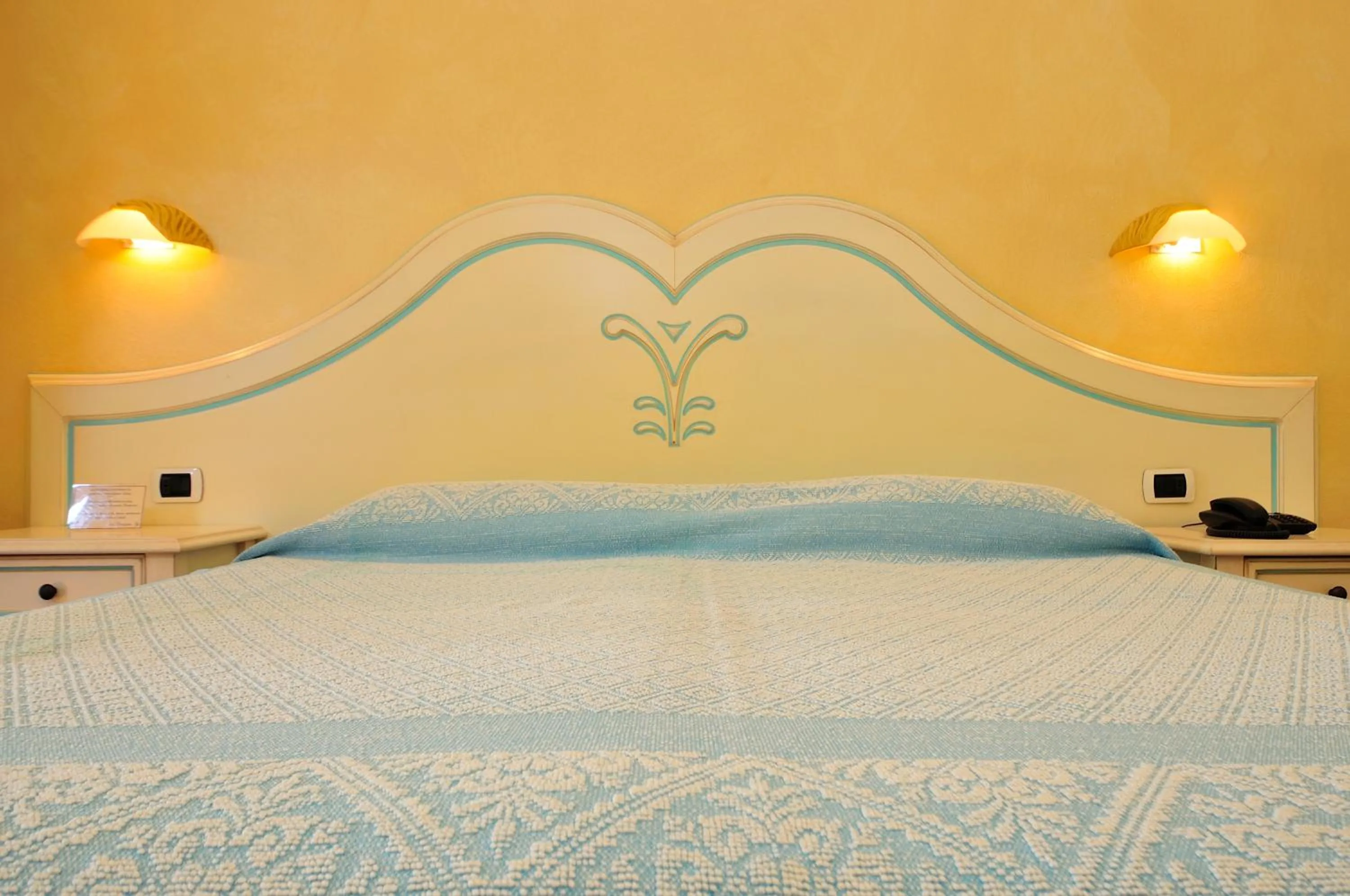 Bed in Hotel Club Saraceno - Bovis Hotels