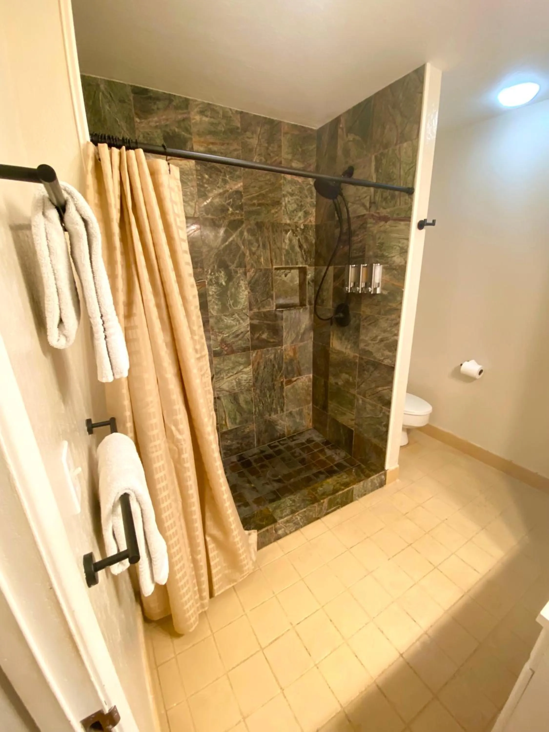 Shower in Black Sands Beach Condo with Full Kitchen