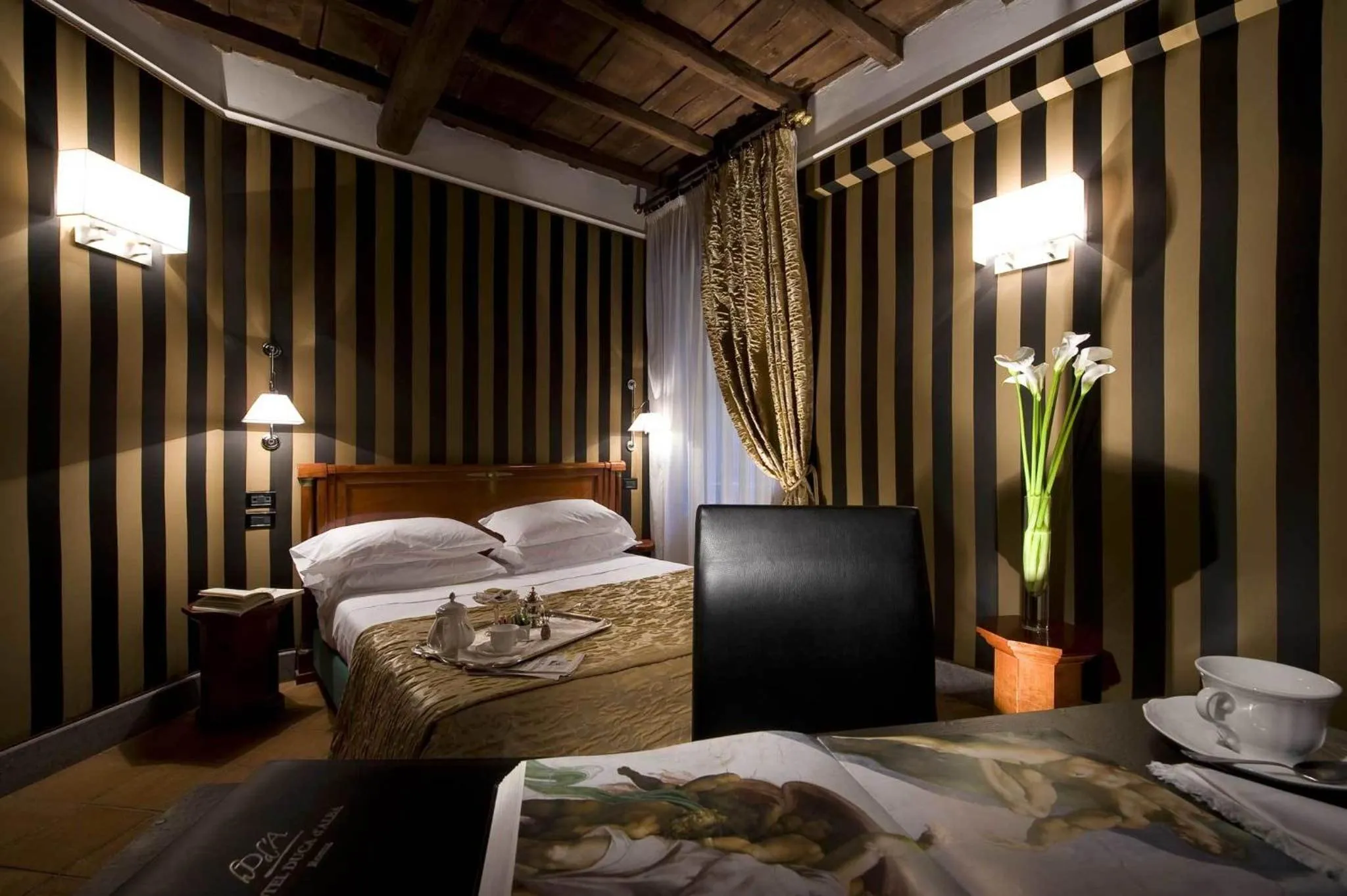 Photo of the whole room, Bed in Duca d'Alba Hotel - Chateaux & Hotels Collection