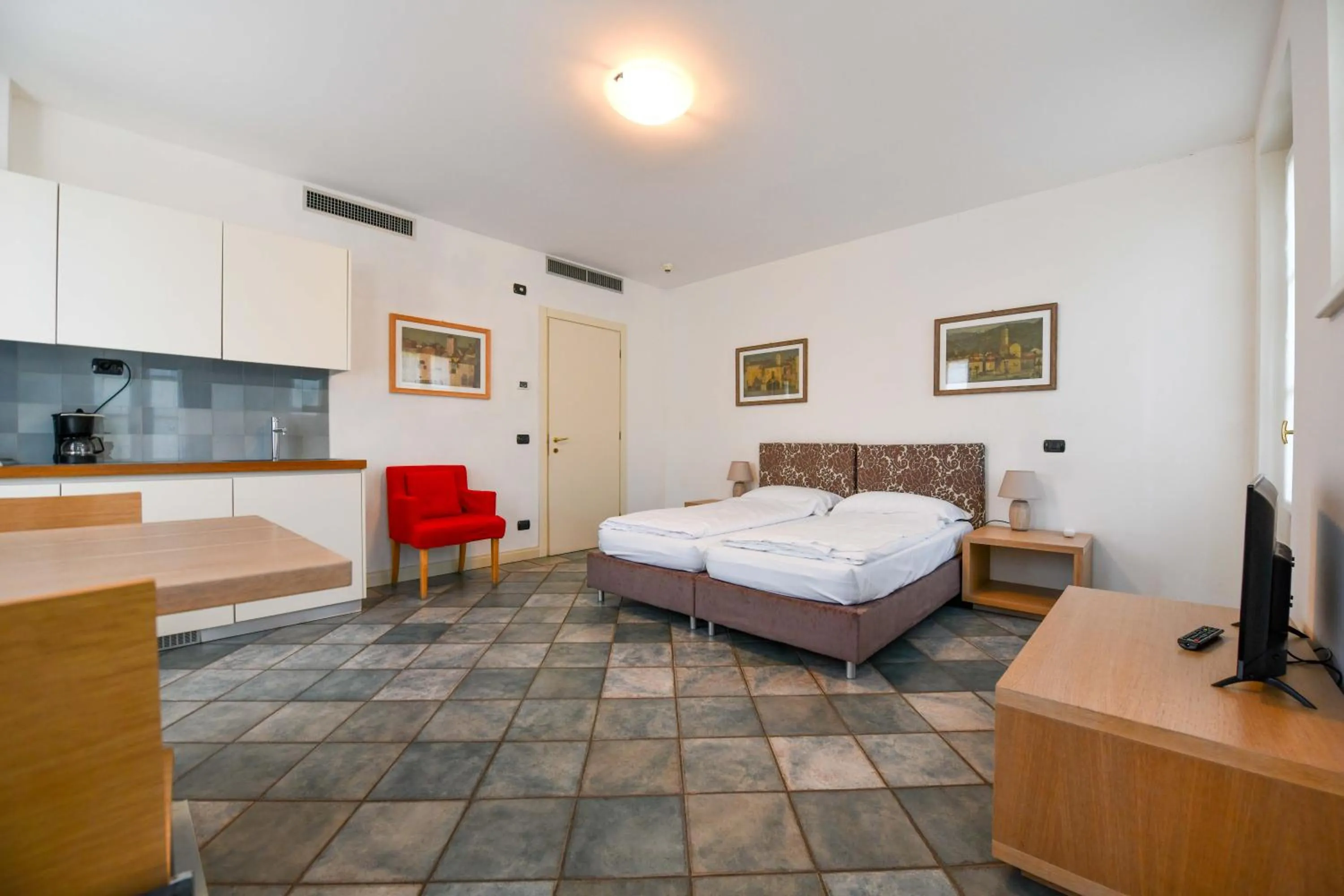 Living room, Bed in Aquazzurra Resort & Aparthotel