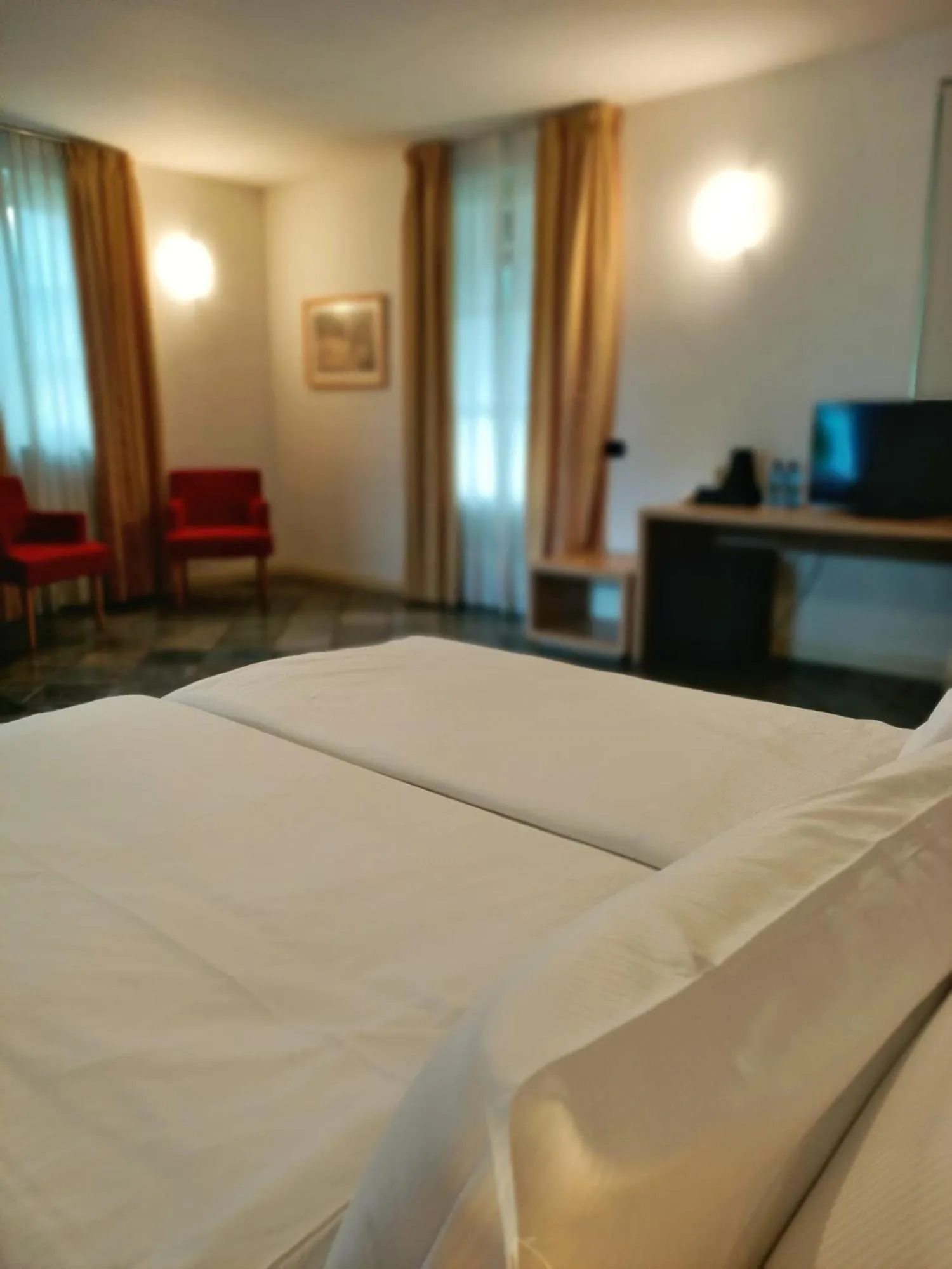 Bed in Aquazzurra Resort & Aparthotel