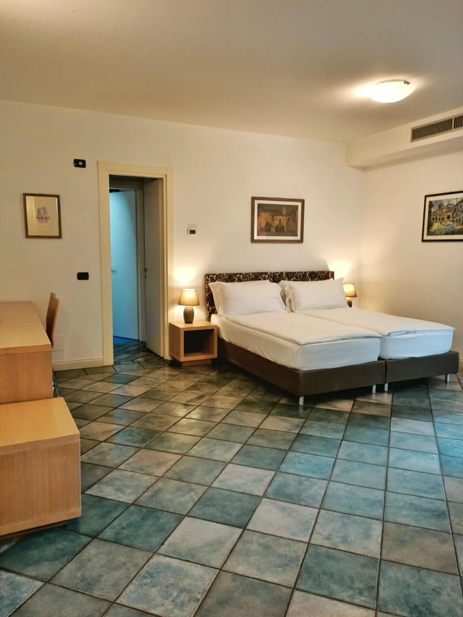 Bed in Aquazzurra Resort & Aparthotel