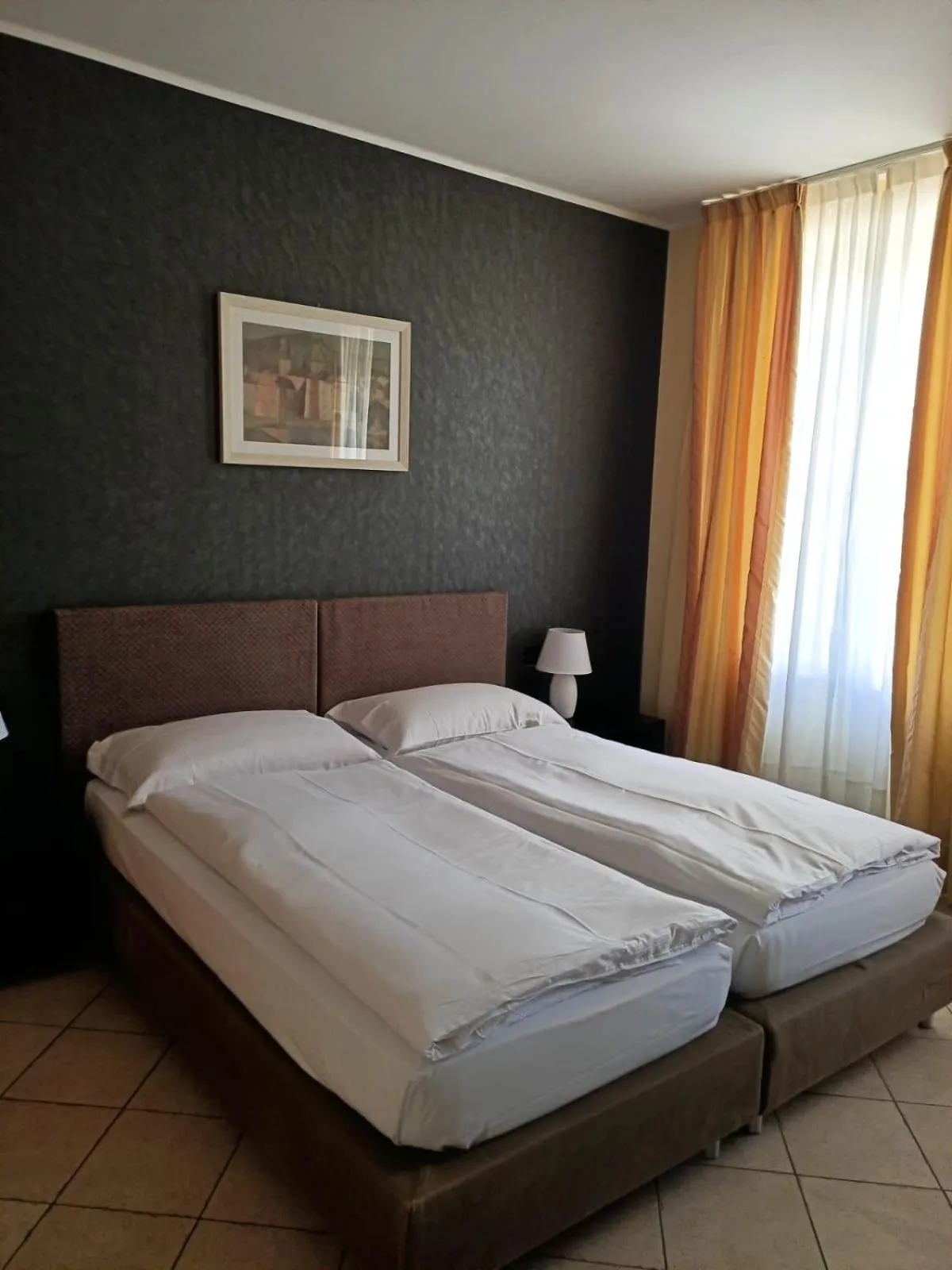 Bed in Aquazzurra Resort & Aparthotel