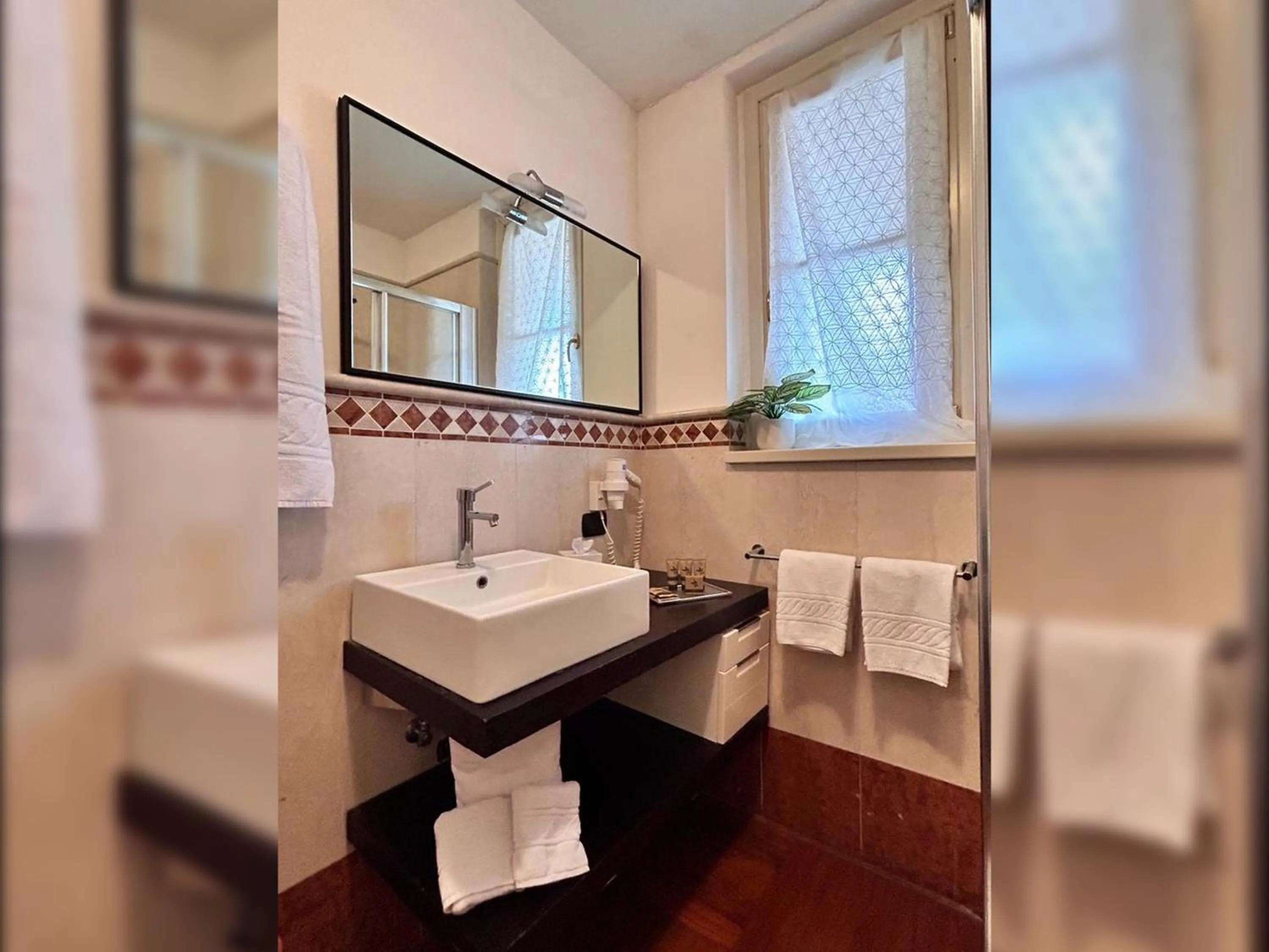 Bathroom in Aquazzurra Resort & Aparthotel