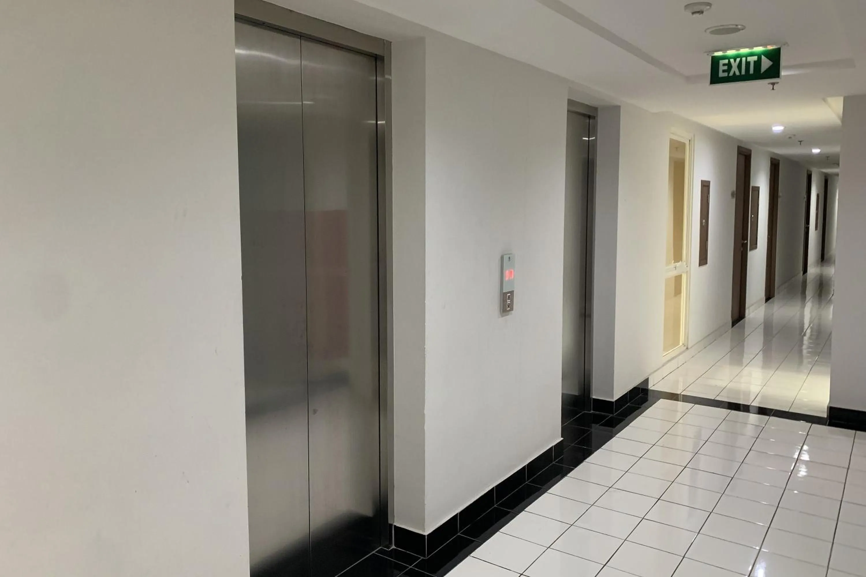 elevator in Velito at Podomoro Golf View Apartment