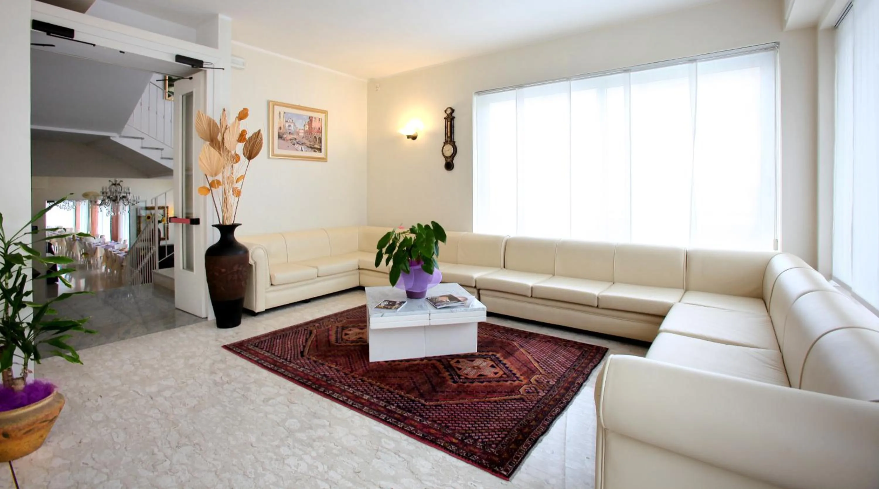 Communal lounge/ TV room in Hotel Torino