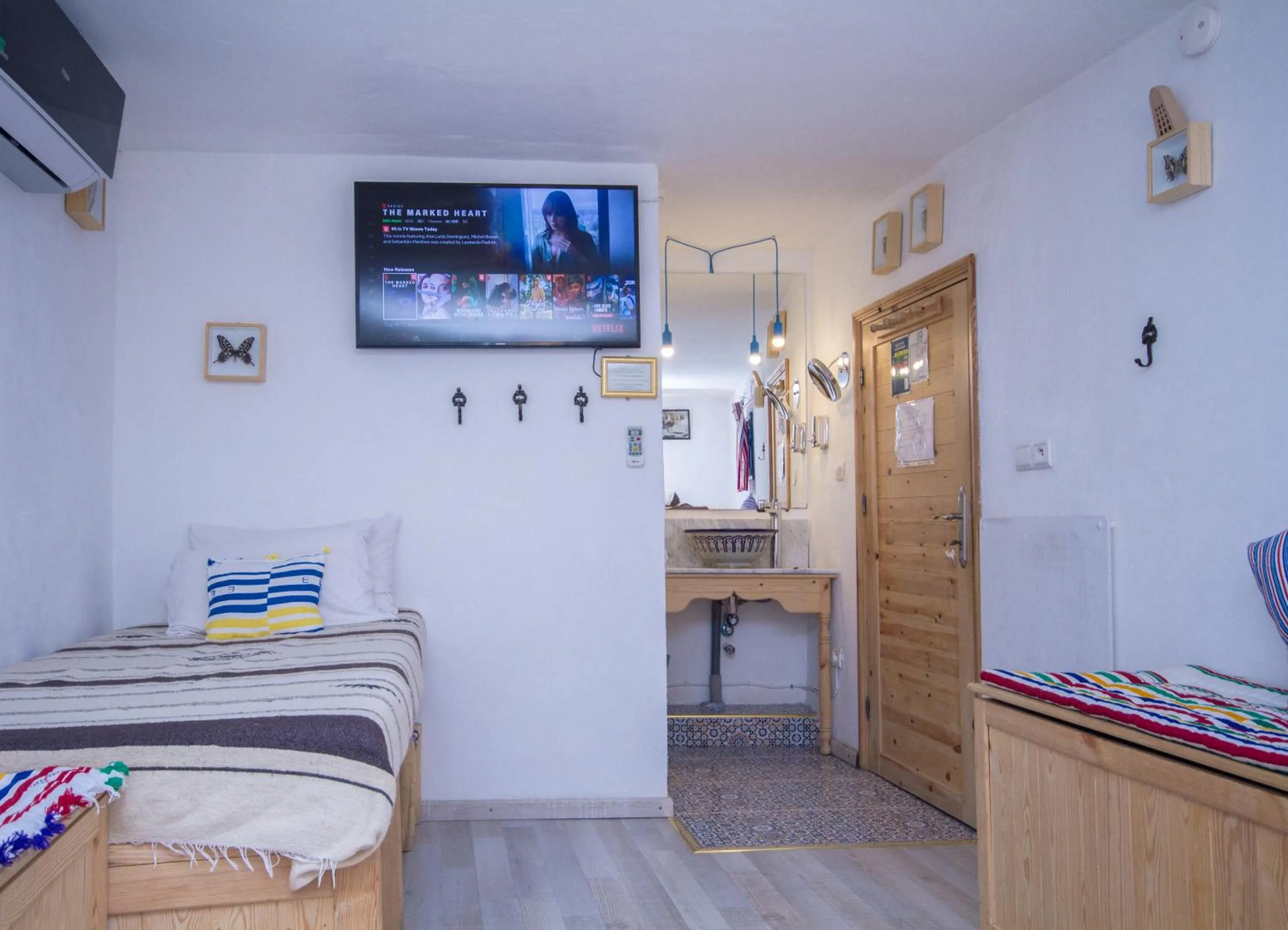 TV and multimedia, Bed in USHA Guest House