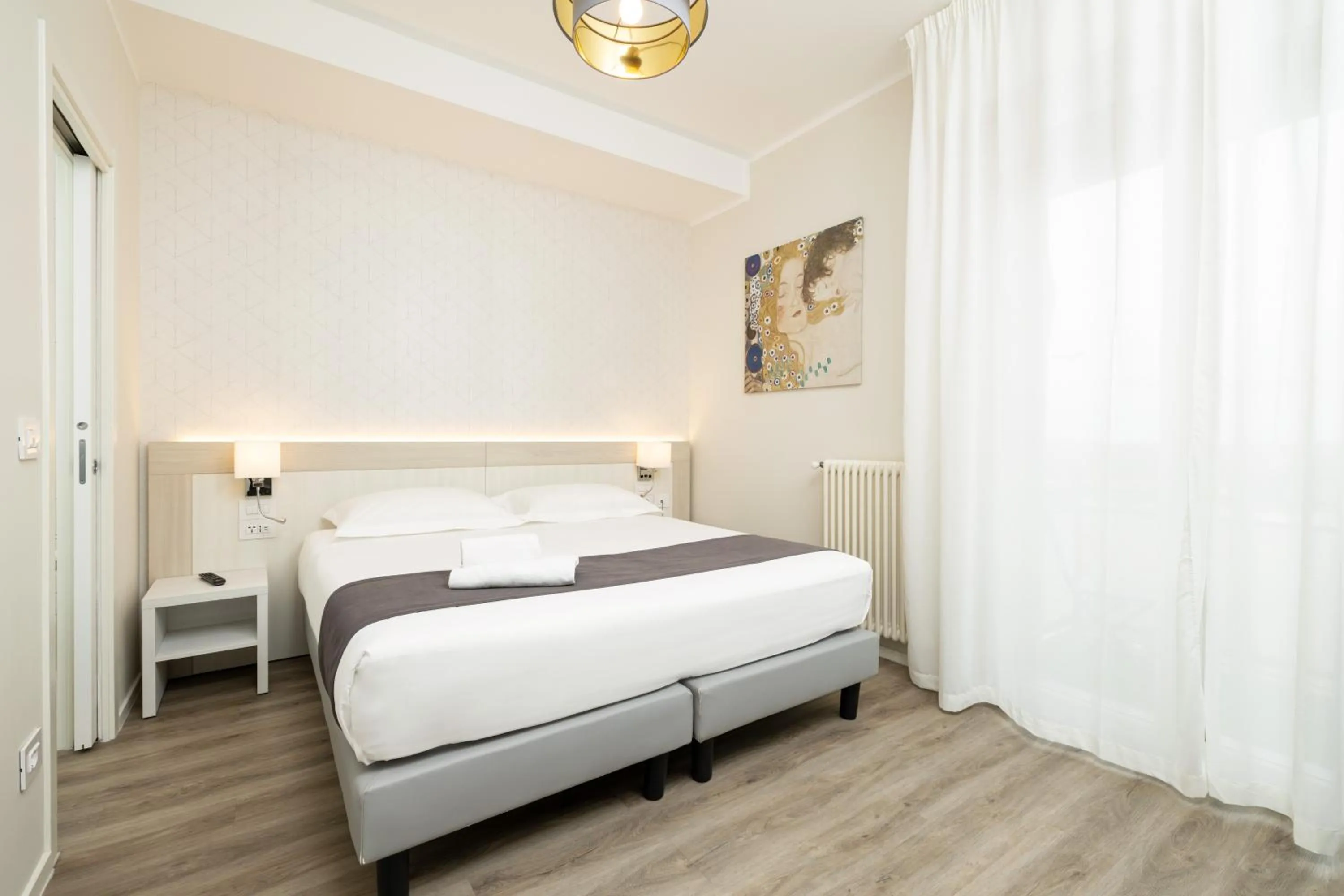 Bed in Hotel Maggiore