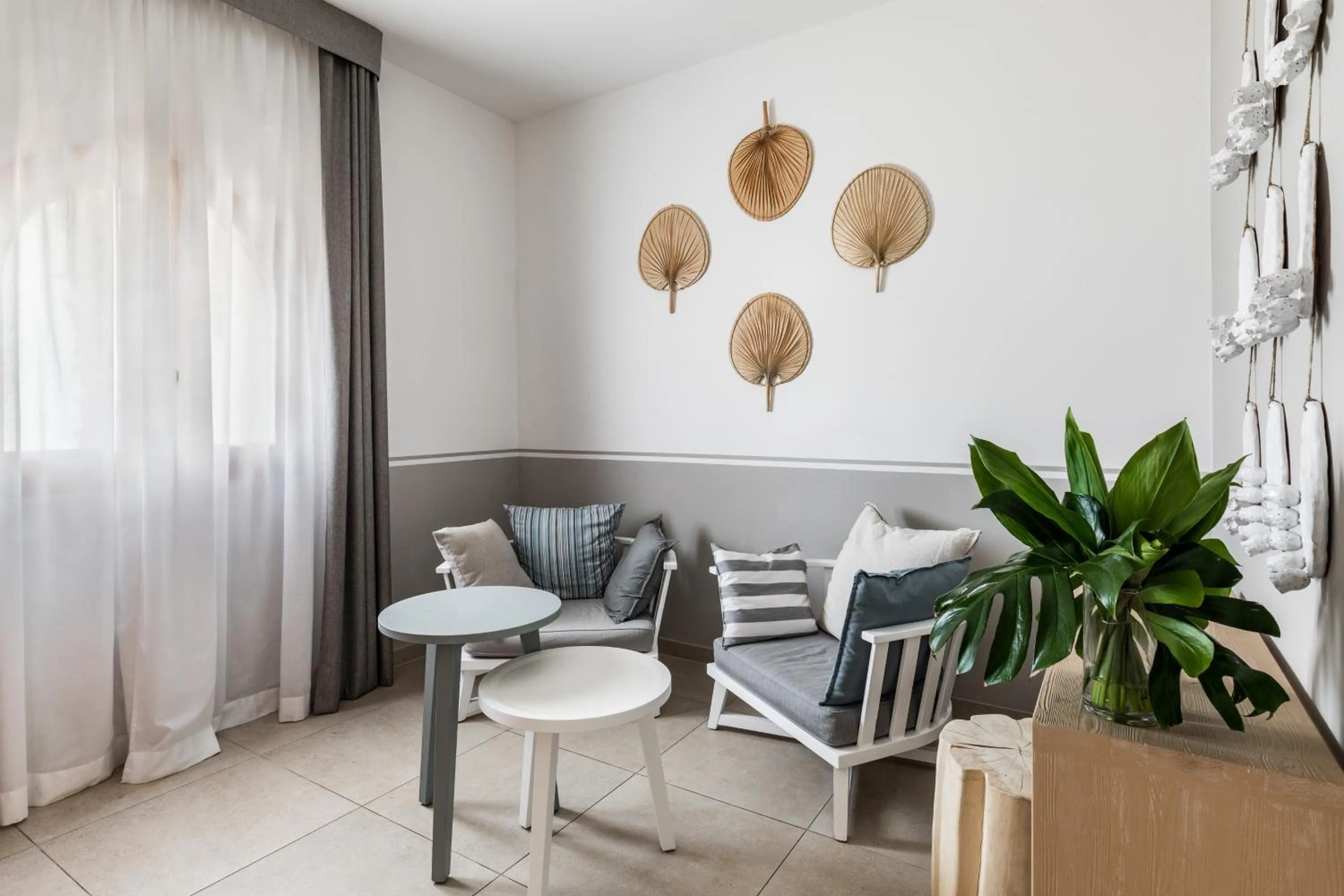 Seating area in Giardino Dei Pini - Boutique Hotel