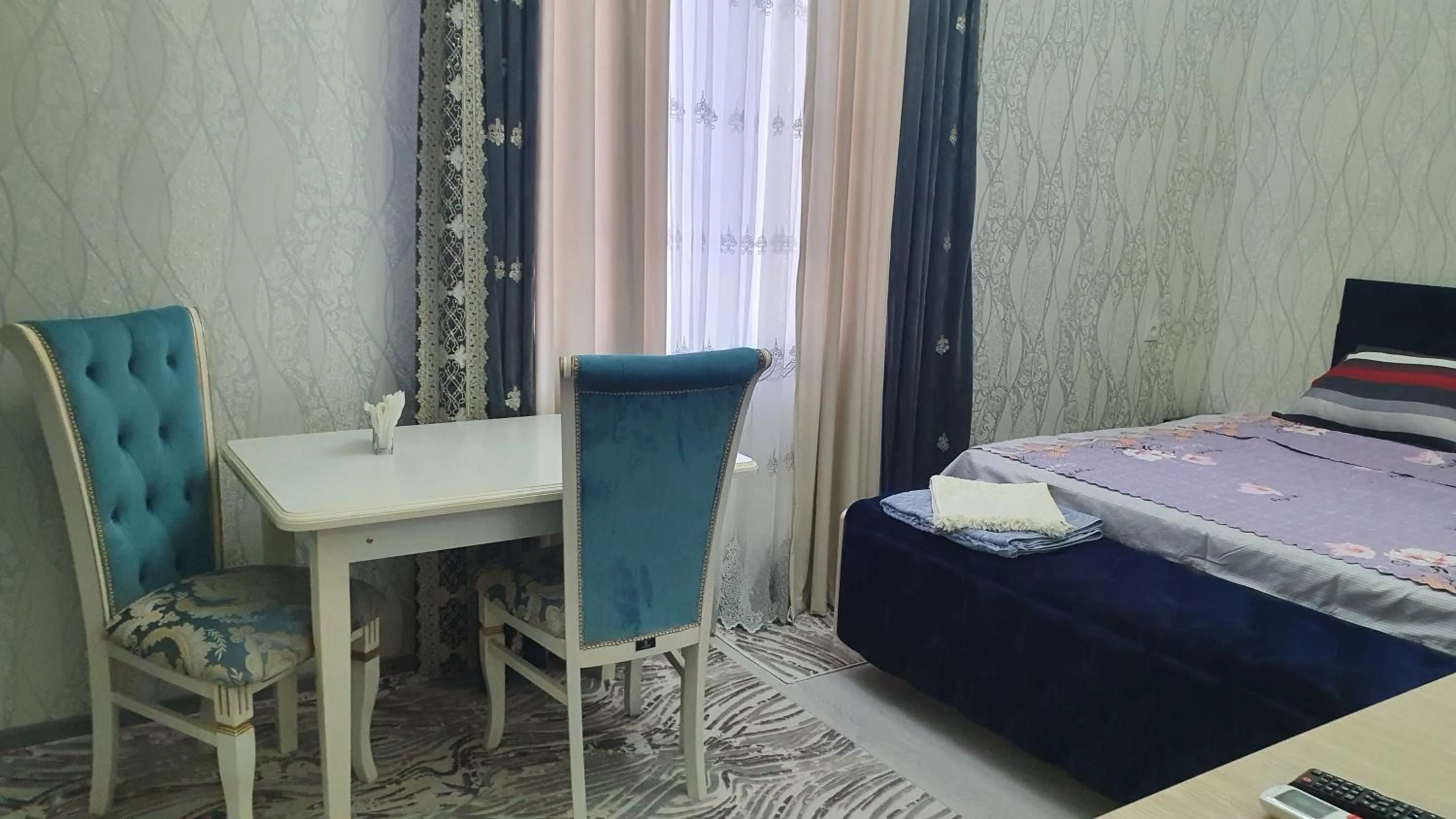 Dining area, Bed in Fayzli GuestHouse